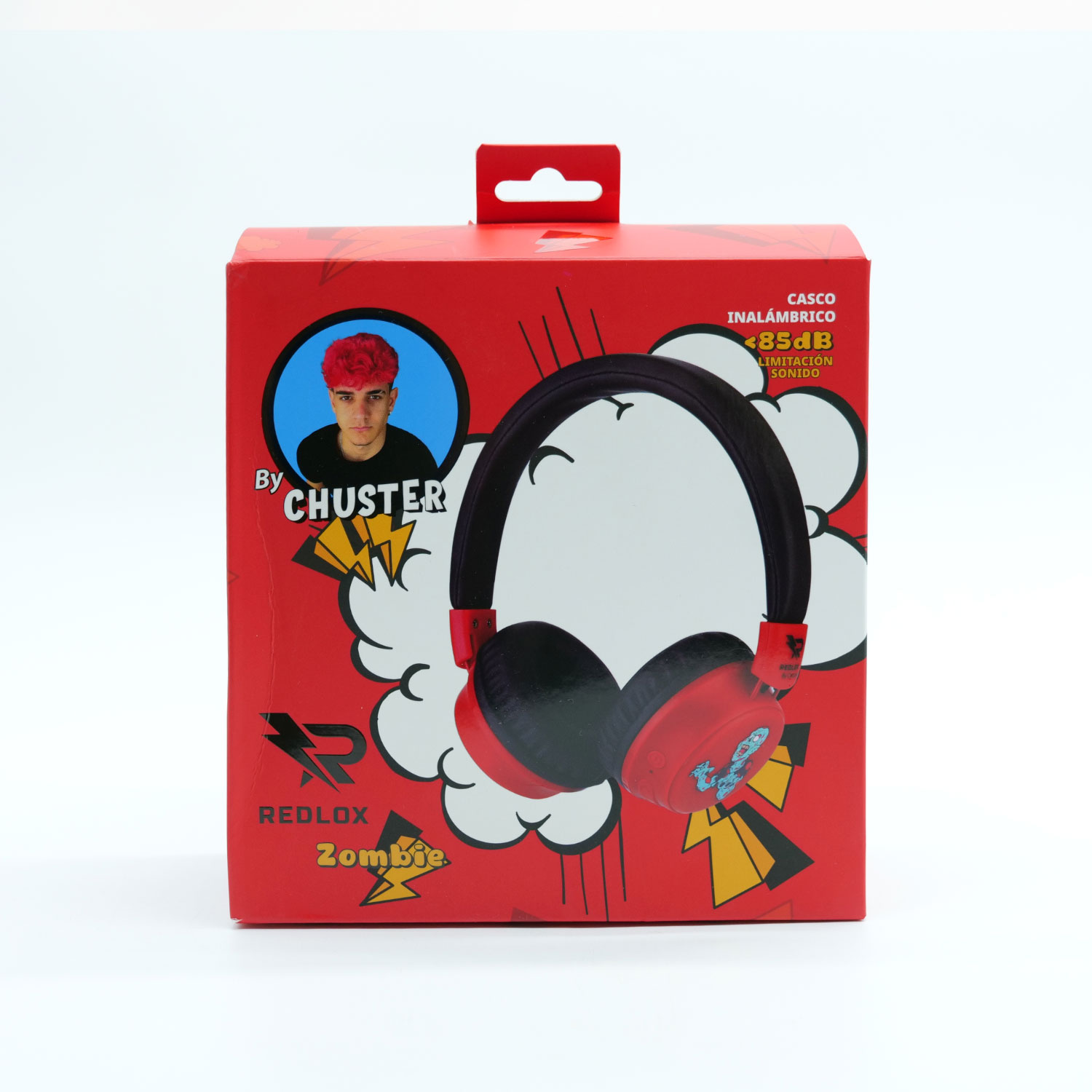 Scatola rossa con cuffie. La scatola presenta un ritratto di una persona con i capelli rossi, la scritta "By CHUSTER" e "REDLOX Zombie".