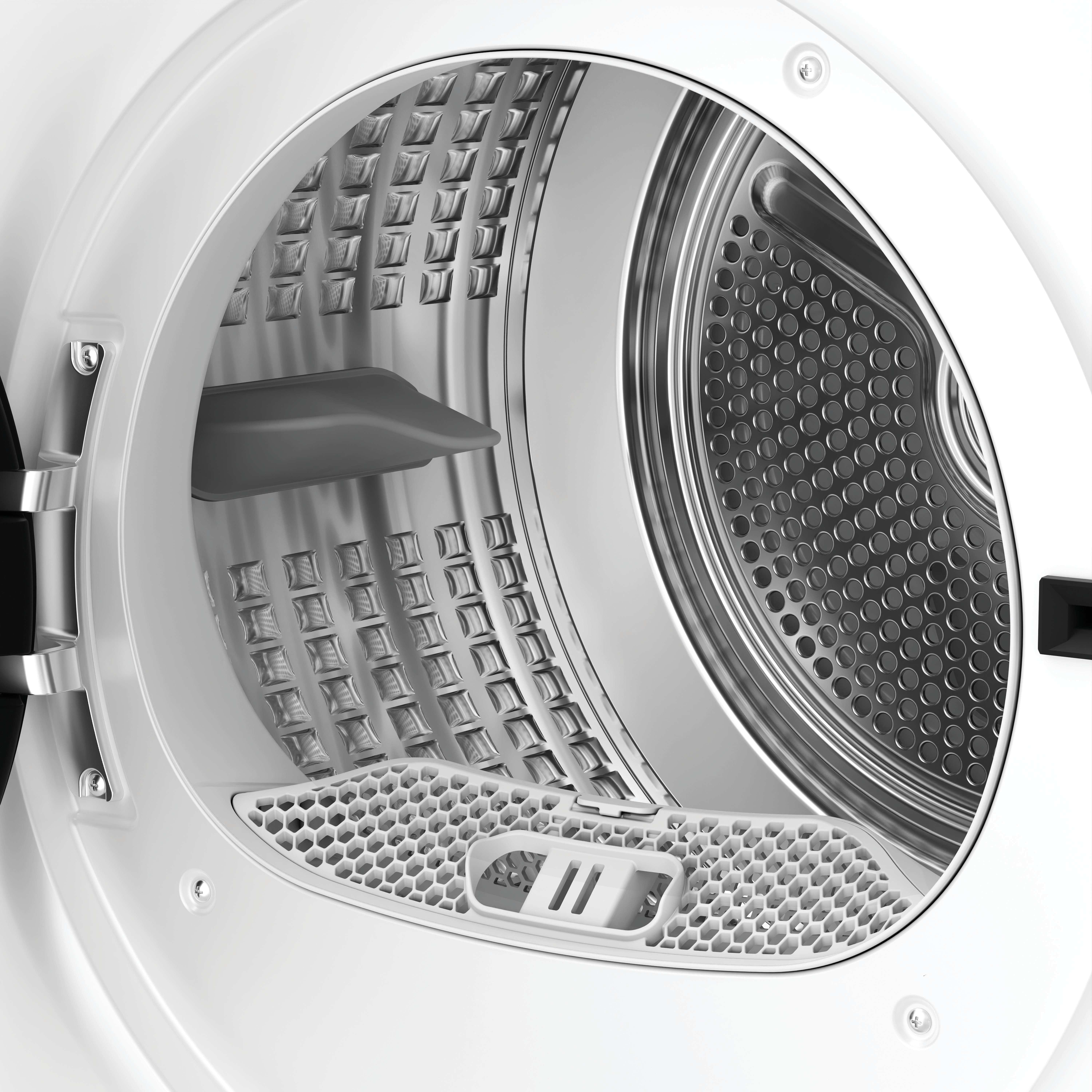 Interno del cestello dell'asciugatrice aperto. Cestello in acciaio inox con fori di ventilazione, parti in plastica bianca e filtro grigio.