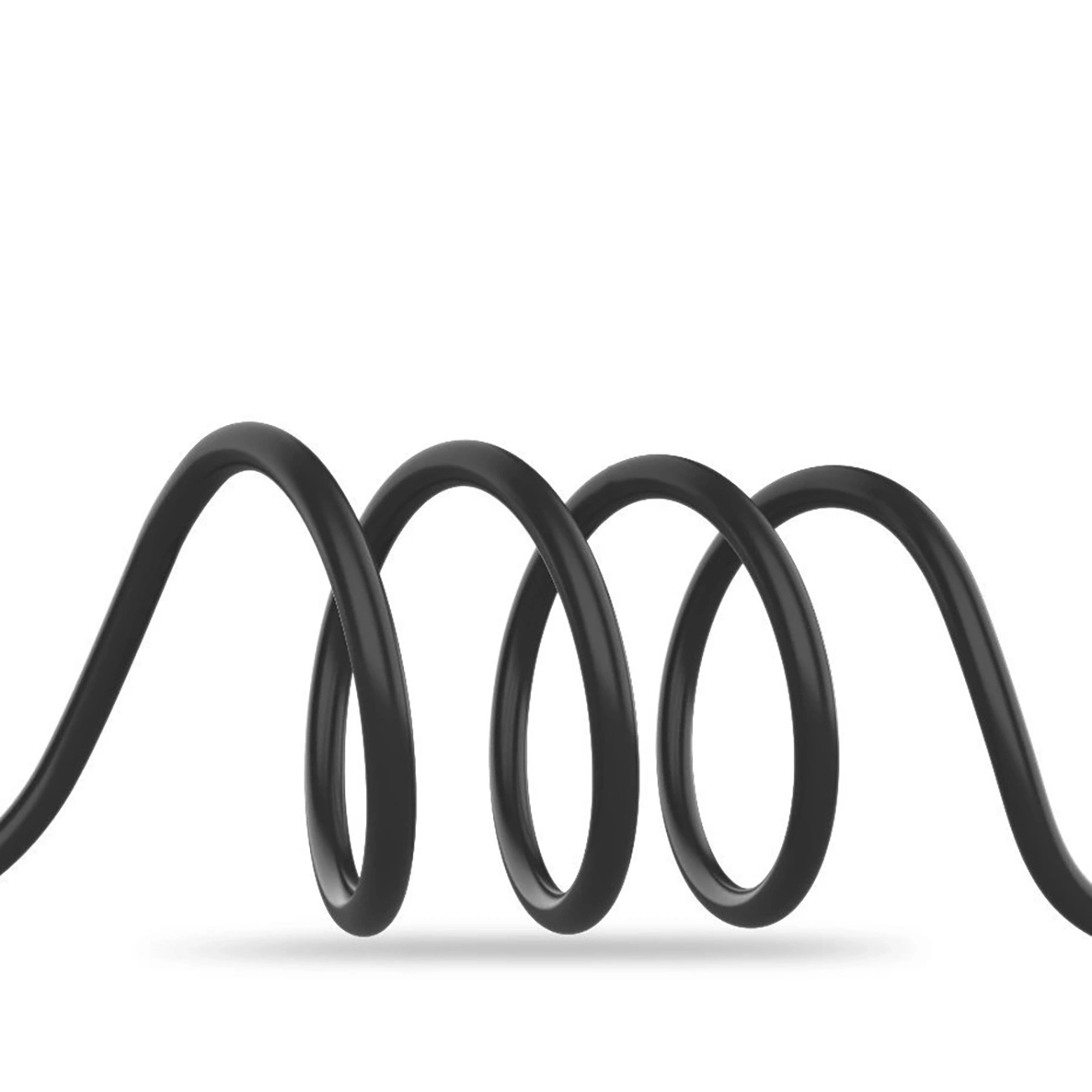 Czarny, zwinięty kabel na białym tle. Kabel tworzy kształt sprężyny, rzucając miękki cień.