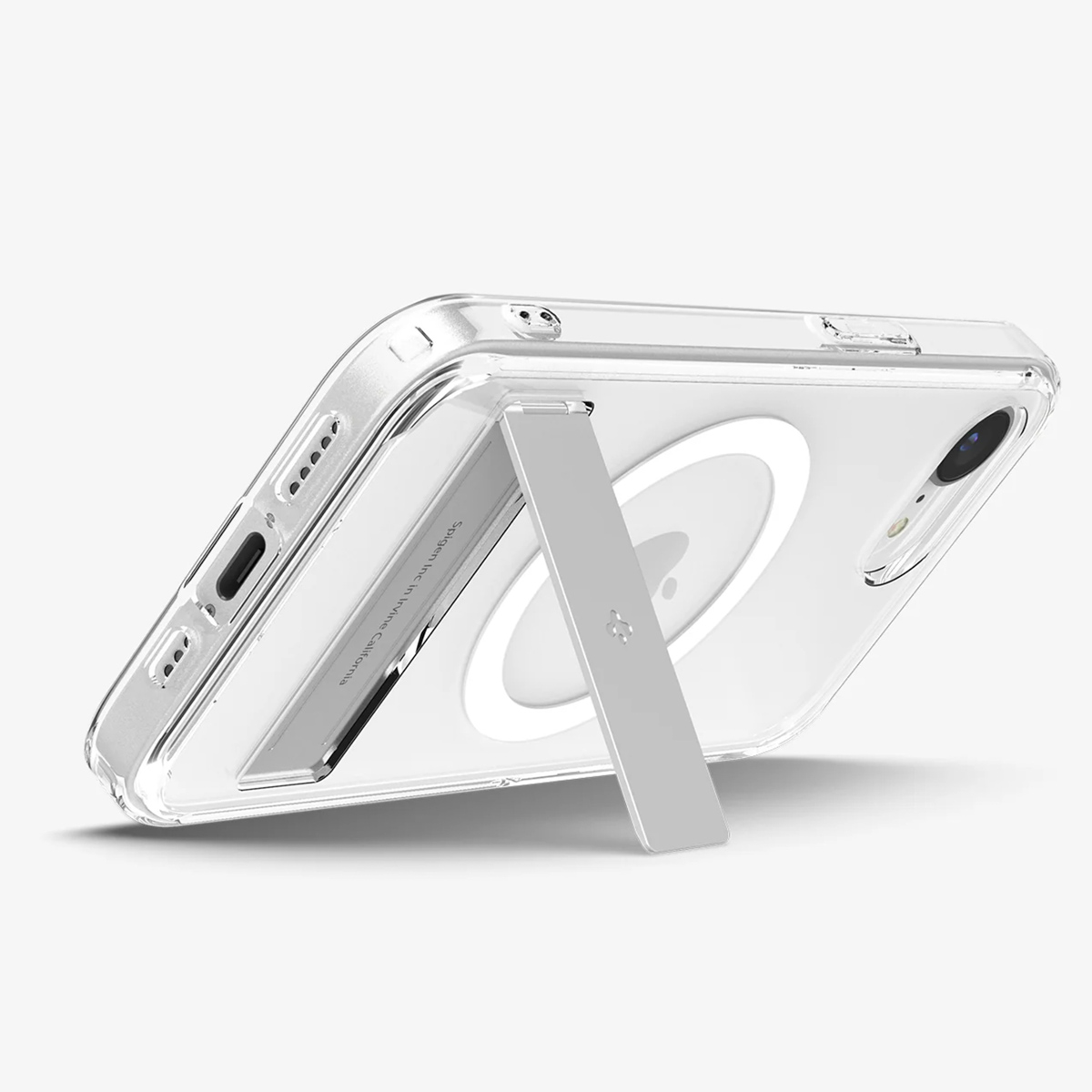Transparente Handyhülle mit silbernem Ständer. Das Telefon ist weiß, die Hülle transparent. Der Ständer ist metallisch.