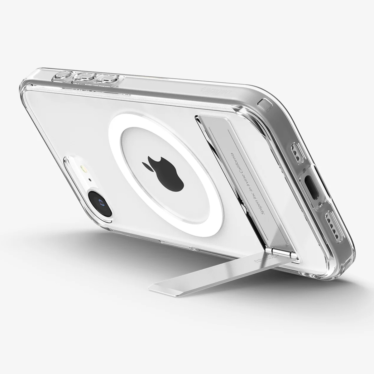 Eine transparente iPhone-Hülle mit Ständer. Das Telefon hat ein Apple-Logo. Die Hülle liegt auf einer weißen Oberfläche mit Schatten.