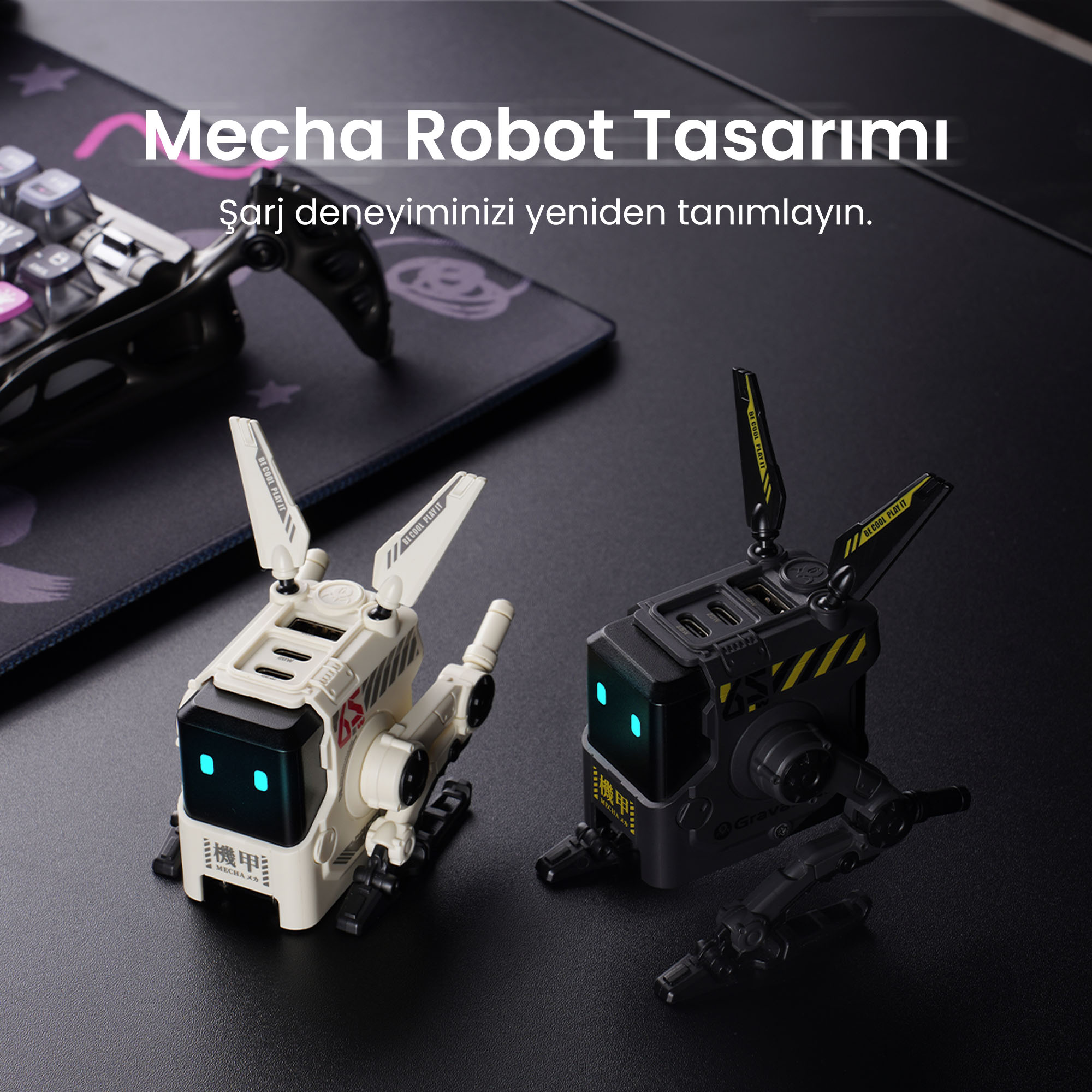 Dwa roboty na biurku, jeden biały, jeden czarny. Klawiatura w tle.