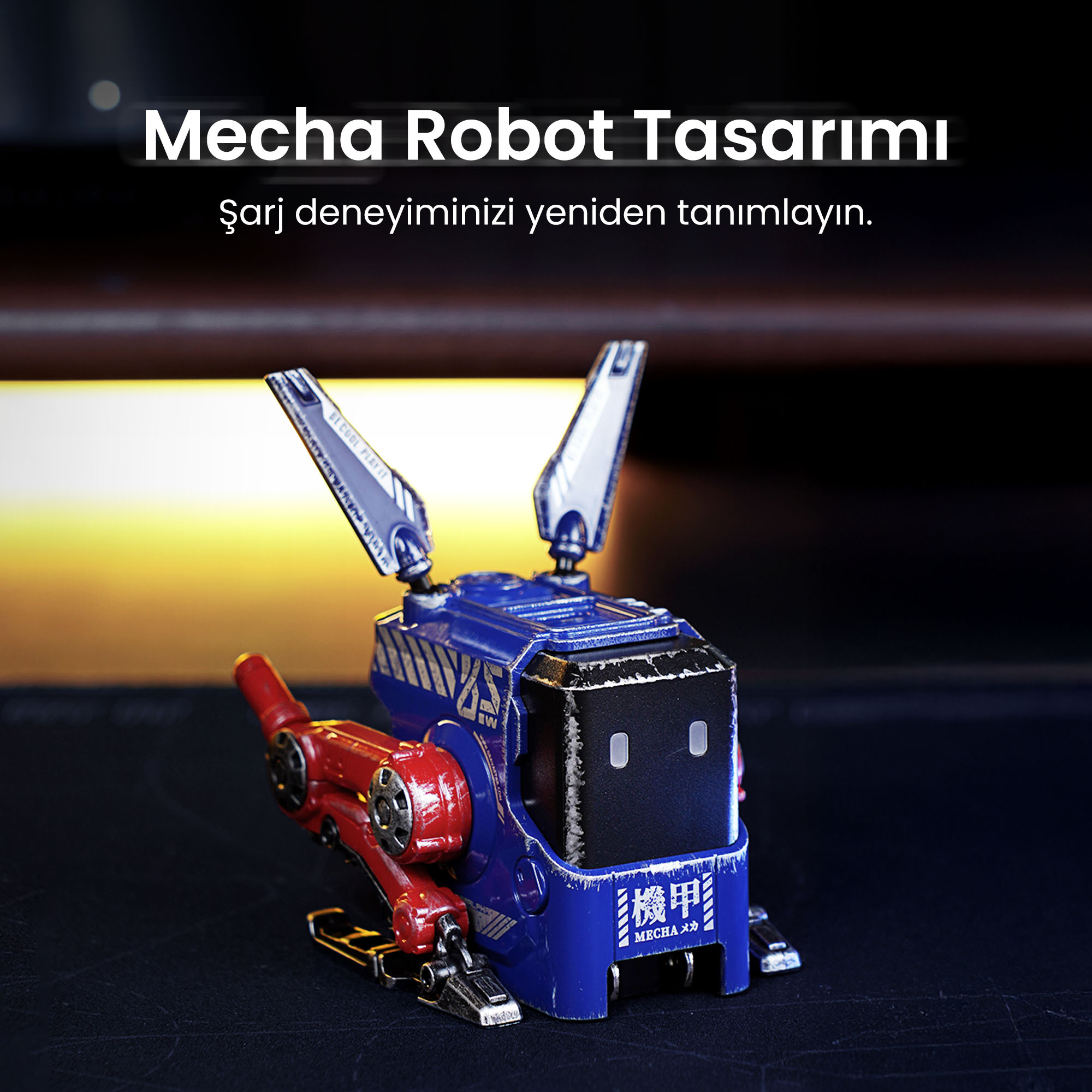 Niebiesko-czerwona zabawka robota z tekstem w języku tureckim. Czarna powierzchnia z rozmytym tłem.