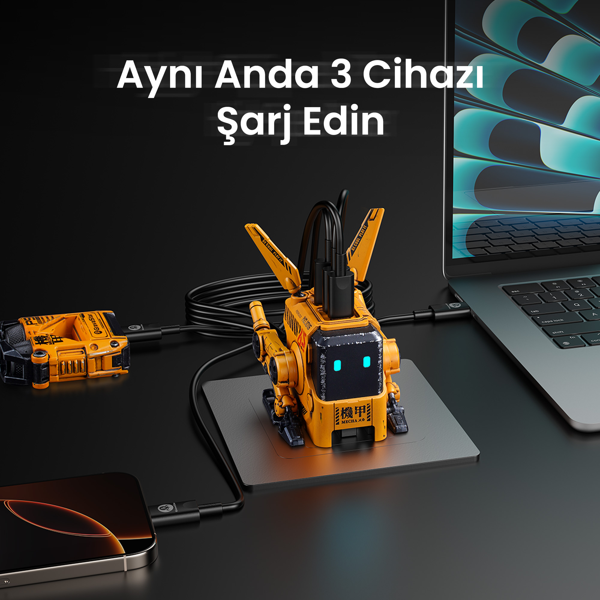 Sarı robot şeklinde bir şarj cihazı, bir telefon ve bir dizüstü bilgisayara bağlı, aynı anda 3 cihazı şarj ediyor.
