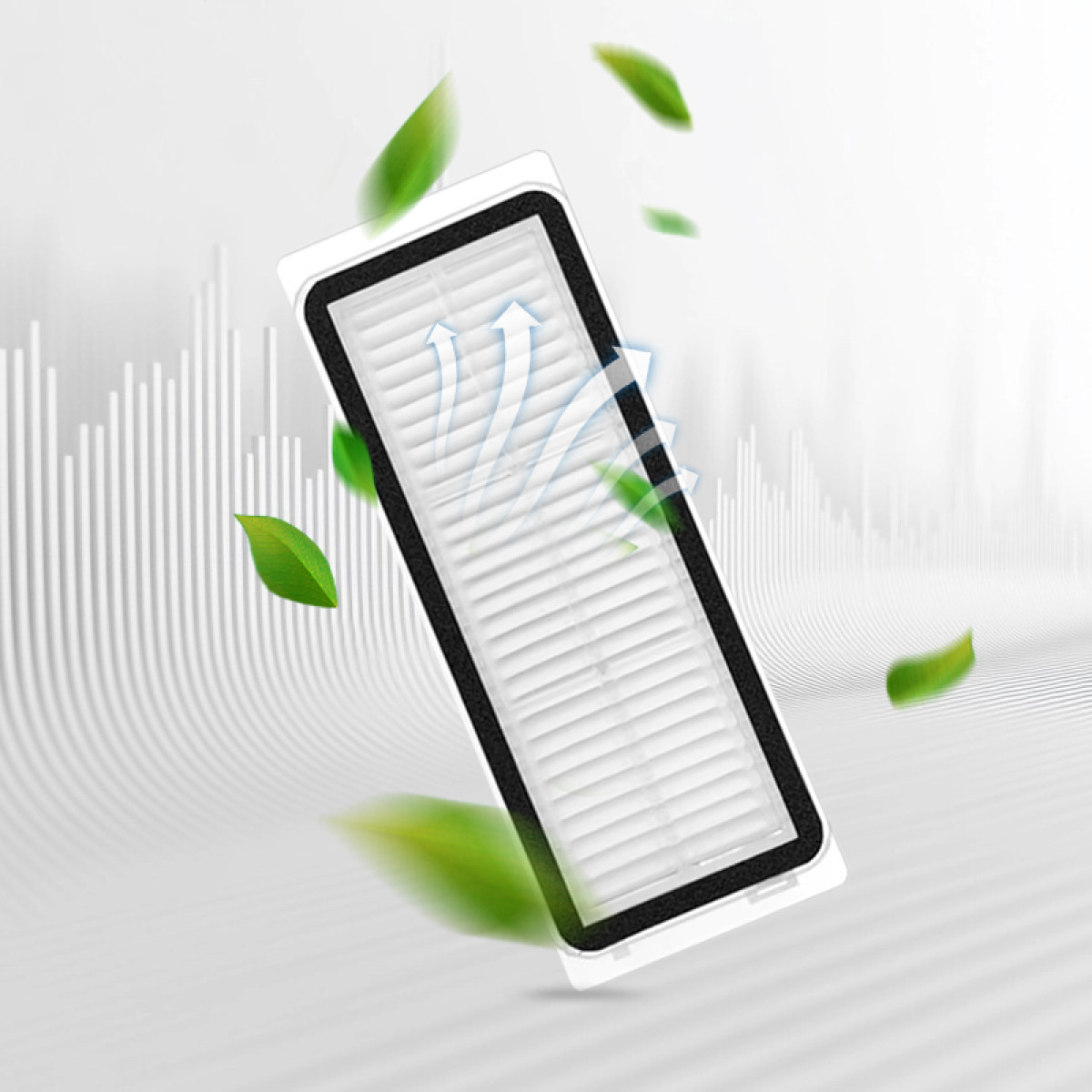 Prostokątny filtr powietrza z czarną ramką i białym wnętrzem, strzałki wskazujące przepływ powietrza. Zielone liście unoszące się wokół. Białe tło.