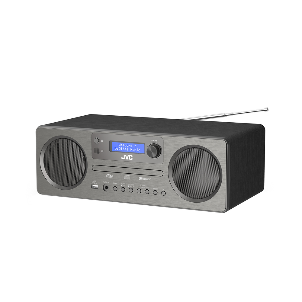 Szare radio cyfrowe JVC z głośnikami, wyświetlaczem z napisem 'Welcome! Digital Radio' i anteną. Posiada różne przyciski sterowania.