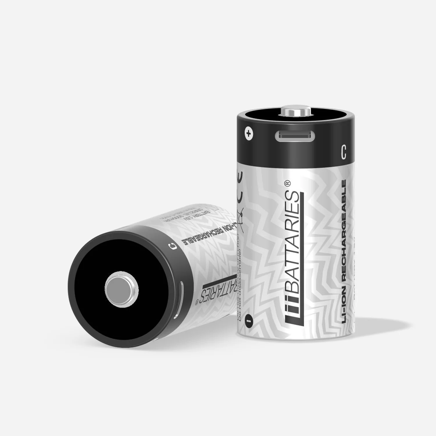 Dwa akumulatory w rozmiarze C. Jeden pionowo, drugi pochylony. Baterie są srebrne z czarnymi górnymi i dolnymi częściami.