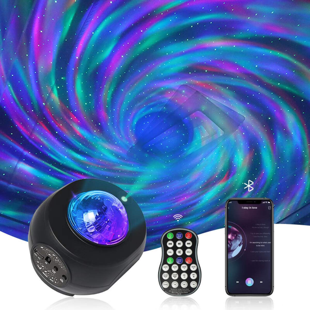 Projektor galaktyki, pilot i telefon z aplikacją muzyczną. Projekcja pokazuje kolorową, wirującą galaktykę.