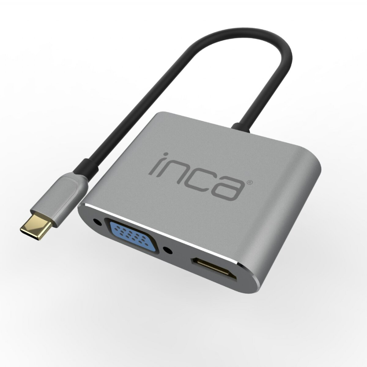 Un adattatore Inca argentato con porte USB-C e VGA/HDMI. Un cavo nero collega l'adattatore a un connettore USB-C.