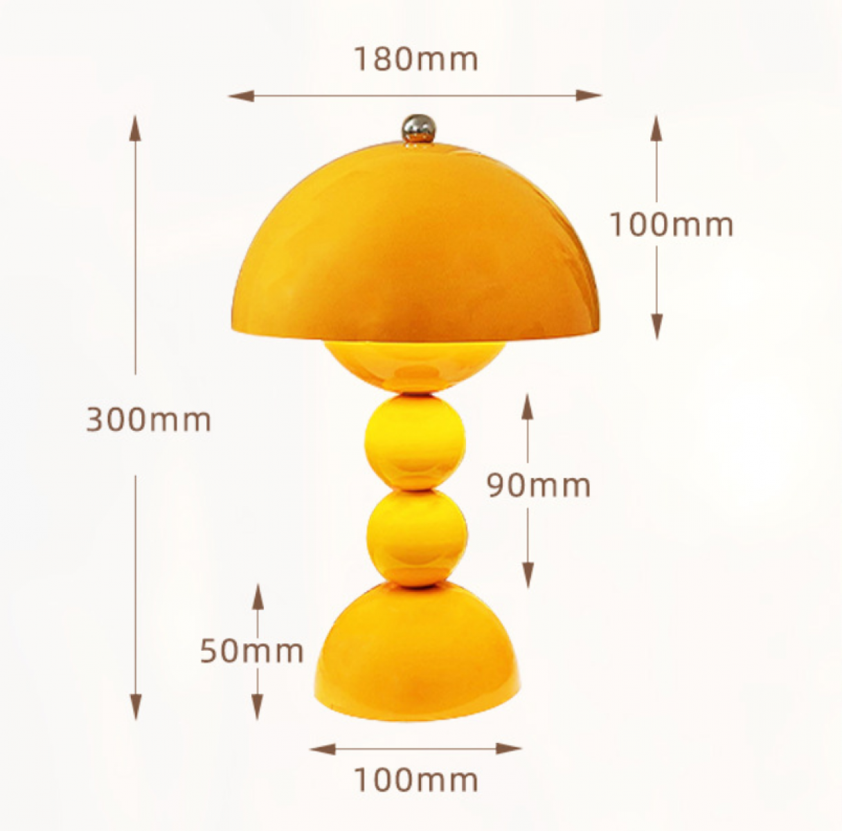 Gelbe Lampe mit rundem Oberteil, drei Kugeln und einem Sockel. Maße: 180 mm, 300 mm, 100 mm, 90 mm und 50 mm.