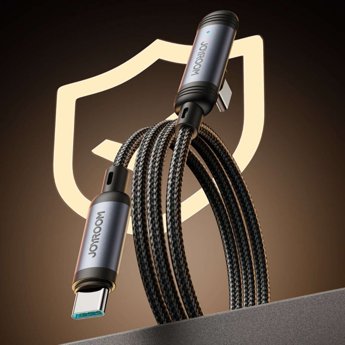 Ein geflochtenes USB-C-Kabel mit dem Logo 'JOYROOM'. Es ist schwarz und grau, mit einem Schutzschild-Logo im Hintergrund.