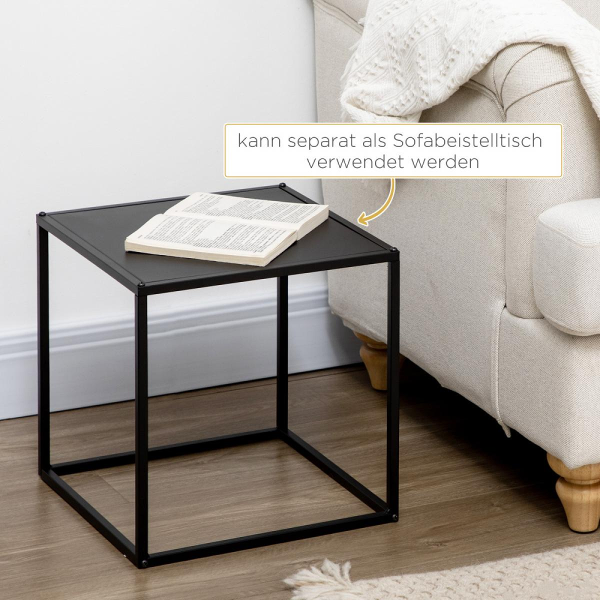Ein schwarzer Beistelltisch mit einem Buch. Im Hintergrund ein cremefarbenes Sofa. Eine Textblase sagt: kann als Beistelltisch verwendet werden.