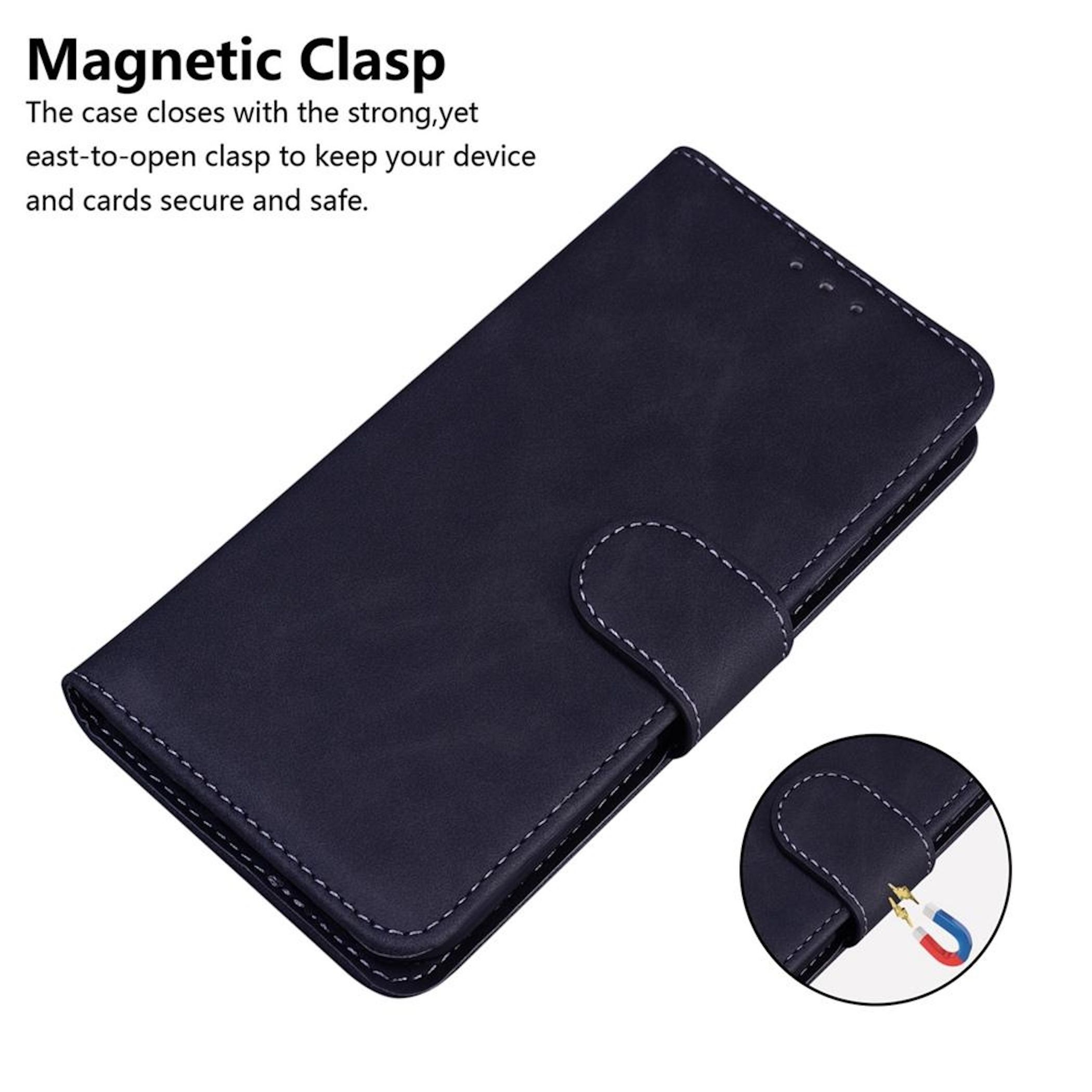 Funda de teléfono azul oscuro con cierre magnético. Costuras blancas y vista circular del imán.