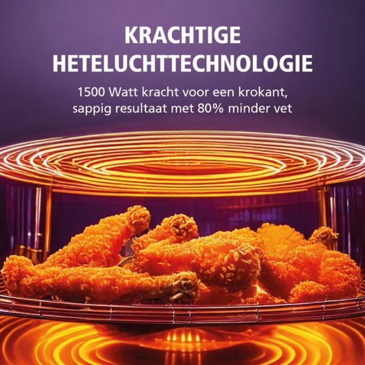 Image shows fried chicken in an air fryer. Orange food, metal basket, and heating elements are visible. Text describes the product.