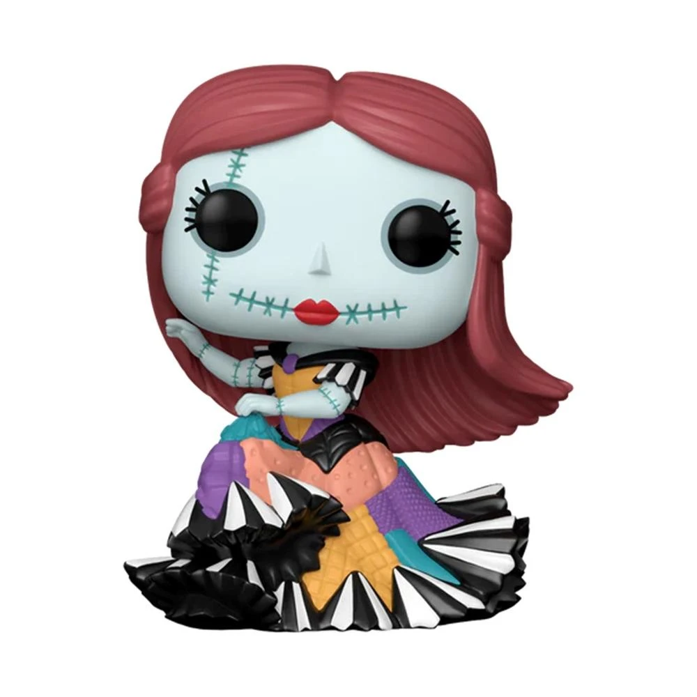 Una statuetta Funko Pop di Sally da The Nightmare Before Christmas. Ha capelli rossi, pelle pallida e un vestito patchwork.