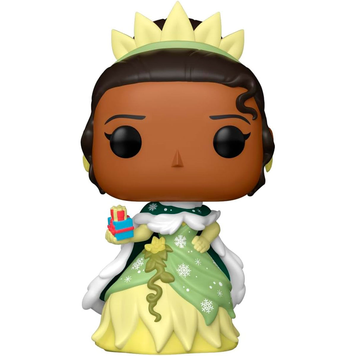 Un Funko Pop de la Princesa Tiana con un regalo. Viste un vestido verde, una corona y tiene piel morena. El fondo es blanco.