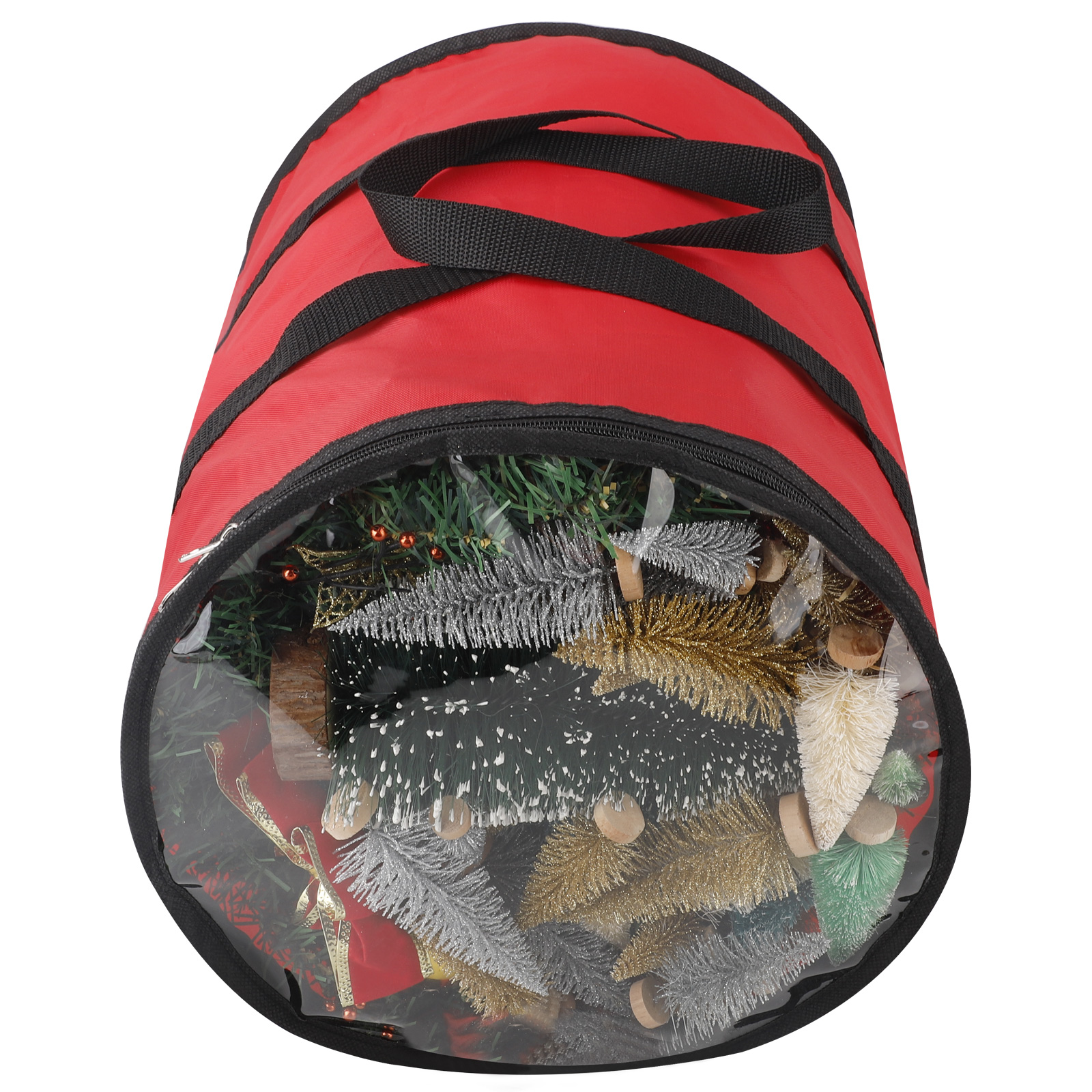 Rote Aufbewahrungstasche mit schwarzen Griffen und Reißverschluss. Enthält kleine Weihnachtsbäume.