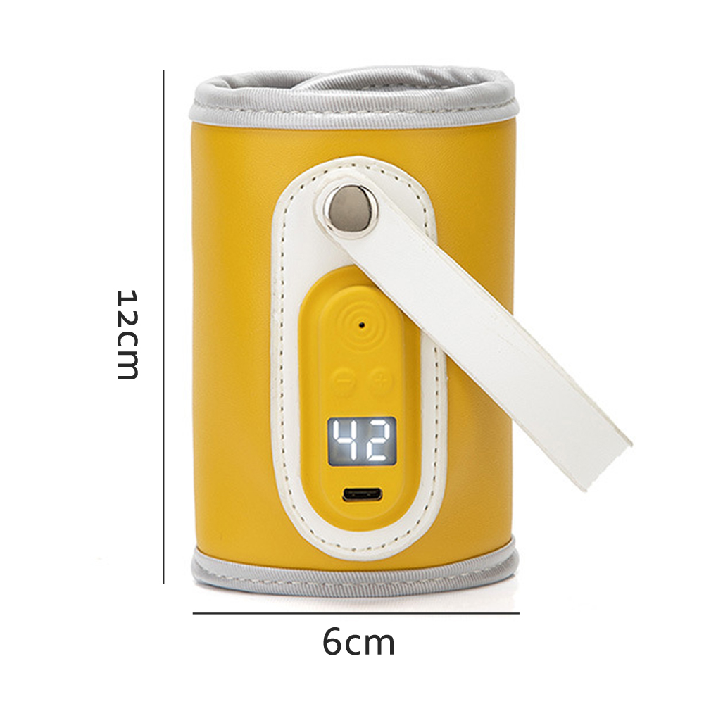 Ein gelber Babyflaschenwärmer mit digitaler Anzeige 42. Er hat einen weißen Griff und einen grauen Rand. Die Abmessungen sind 12 cm x 6 cm.
