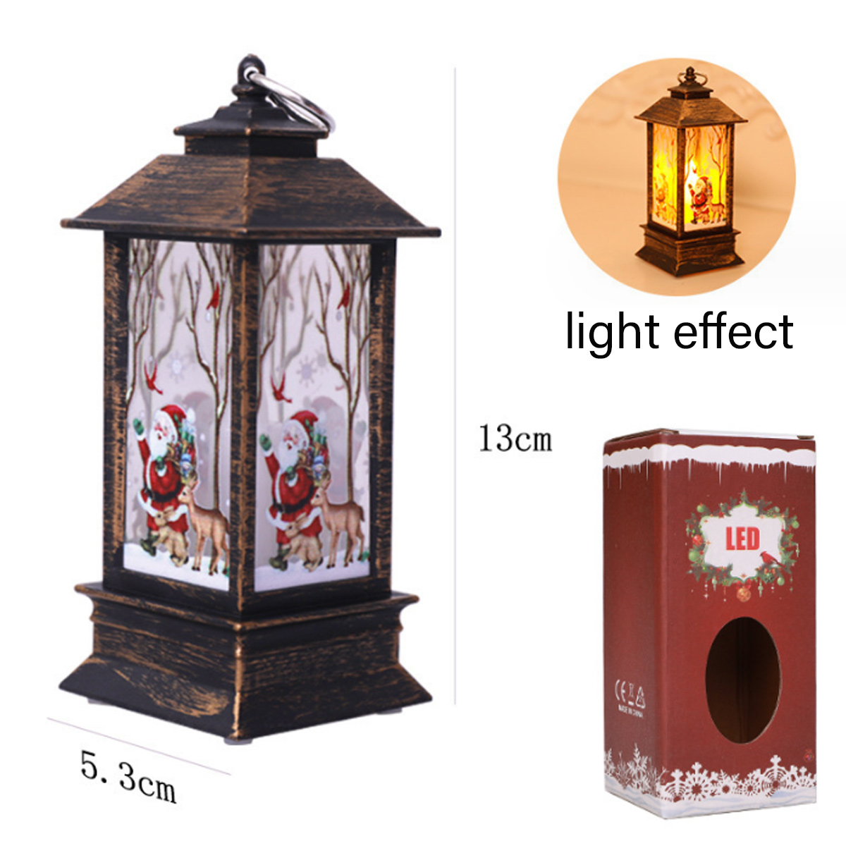 Eine Weihnachtslaterne mit Weihnachtsmann und Rentieren auf den Fenstern. Eine kleine beleuchtete Laterne, eine Schachtel und Maße.