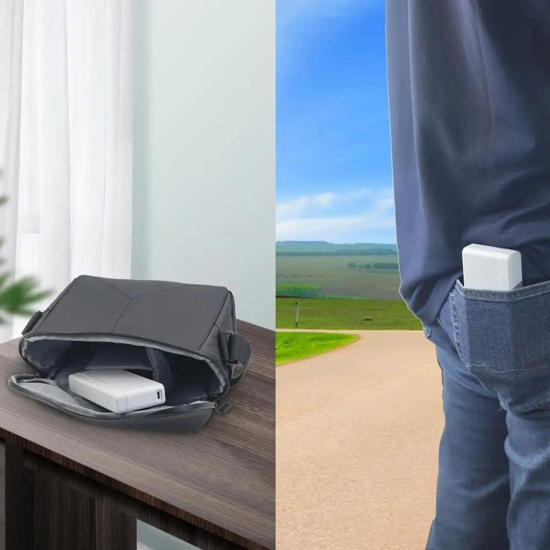 Graue Tasche mit weißem Gerät. Jeans-Hosentasche mit ähnlichem Gerät. Hintergrund: Straße und Felder.