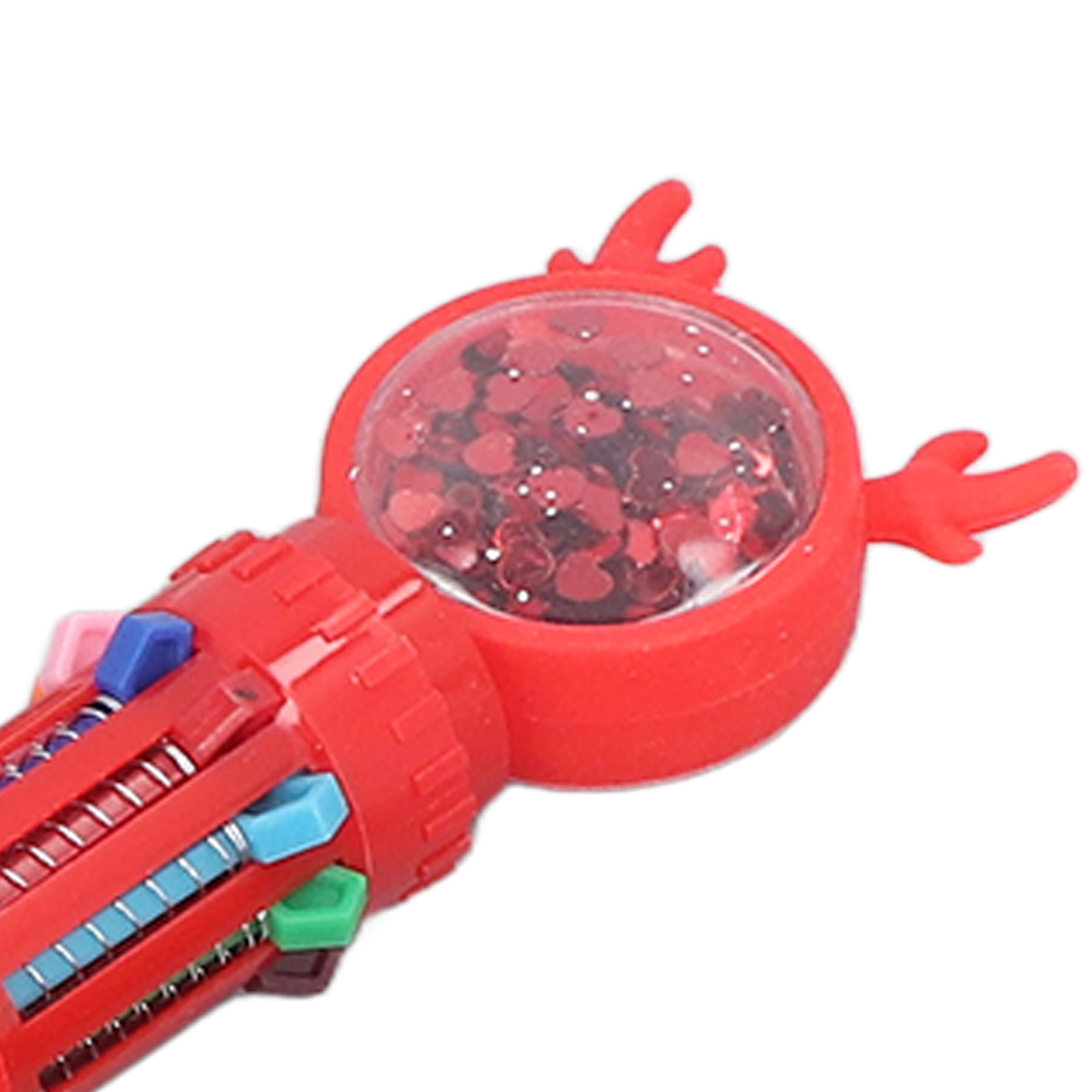 Roter Stift mit durchsichtigem Deckel, gefüllt mit herzförmigem Konfetti. Bunte Stiftspitzen sichtbar.