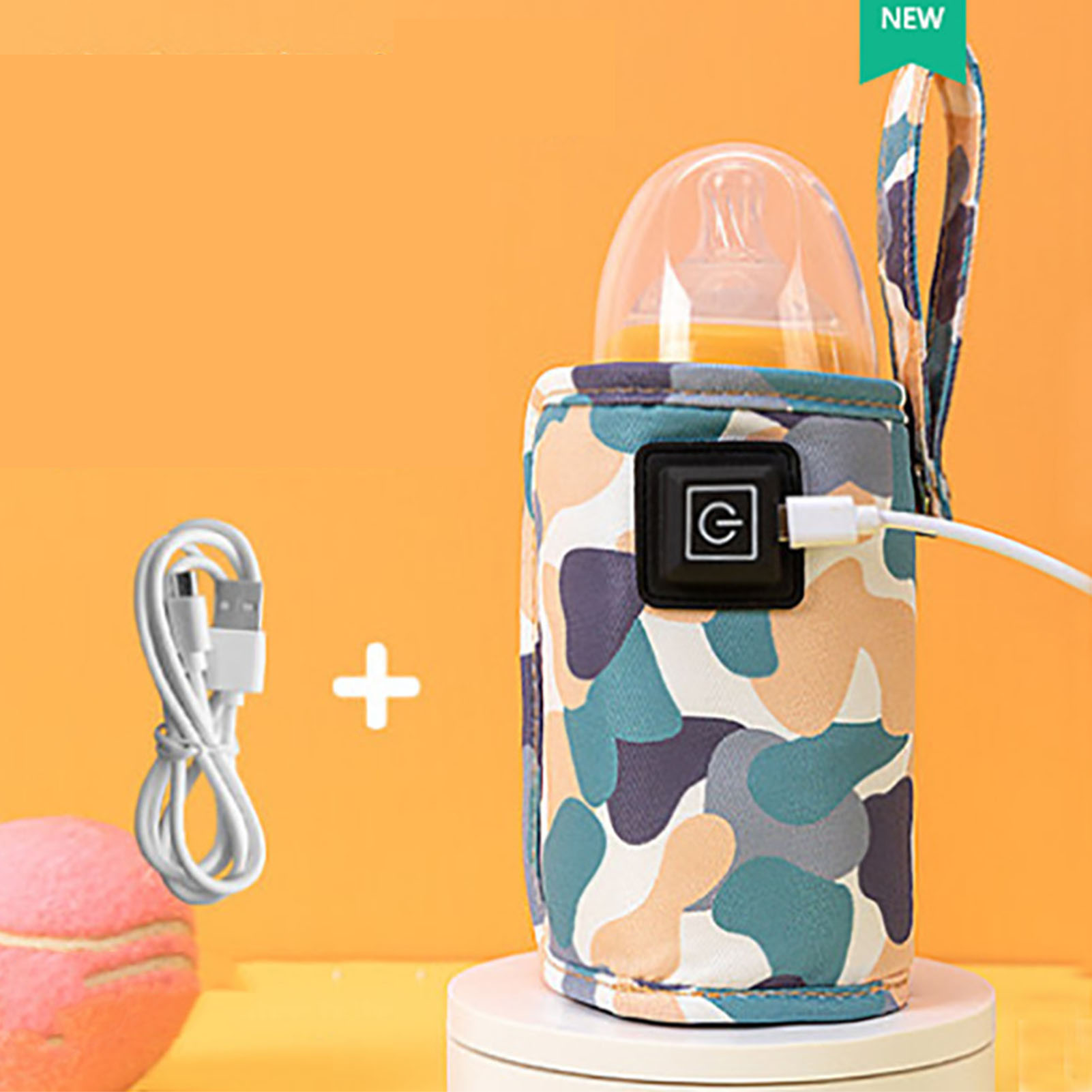 Ein Babyflaschenwärmer mit Tarnmuster, Ein-/Ausschalter, USB-Kabel und einem rosa Ball auf orangefarbenem Hintergrund.