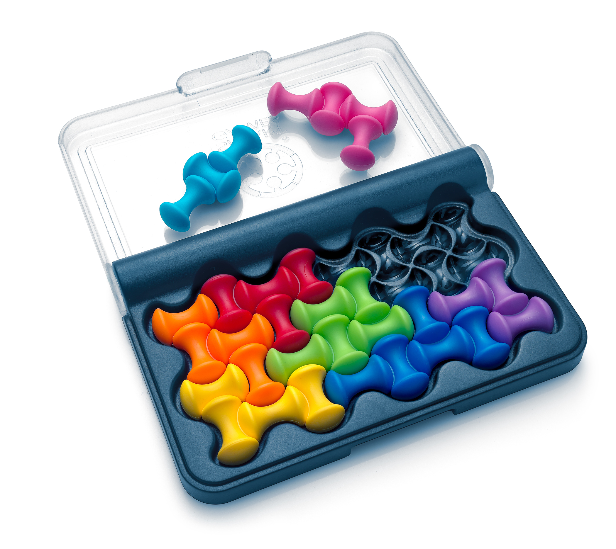 Ein Puzzlespiel mit bunten, pilzförmigen Teilen in einem Kasten. Einige Teile sind draußen, andere drinnen, nach Farben angeordnet.