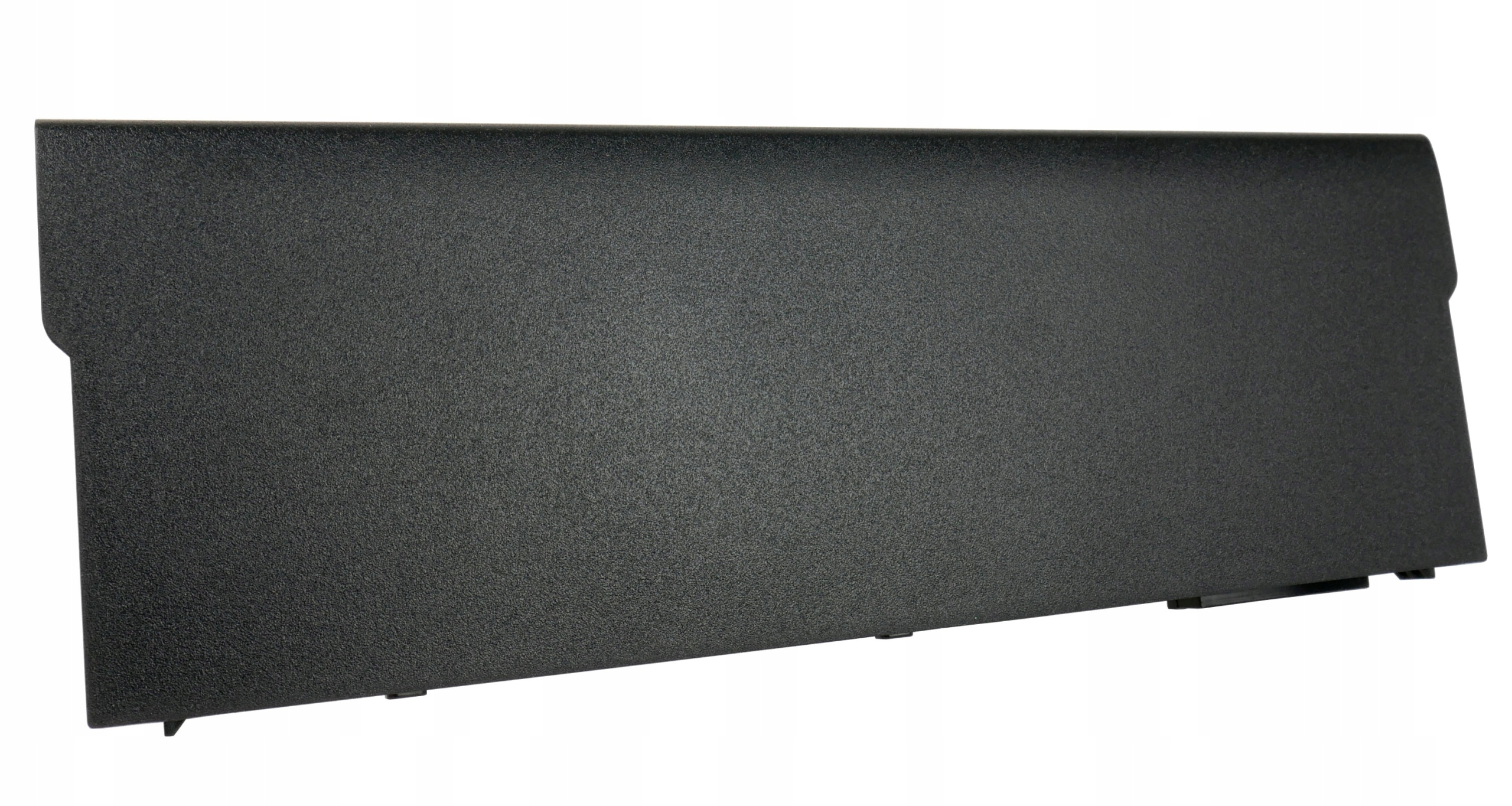 Zbliżenie czarnego, teksturowanego przedmiotu z tworzywa sztucznego. Wygląda na element laptopa na białym tle.