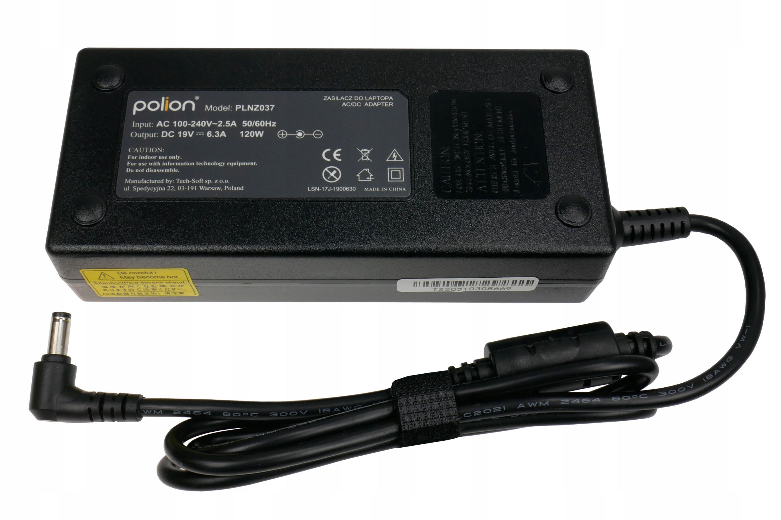 Czarny zasilacz AC/DC z przewodem zasilającym. Posiada etykiety tekstowe i naklejkę ostrzegawczą.