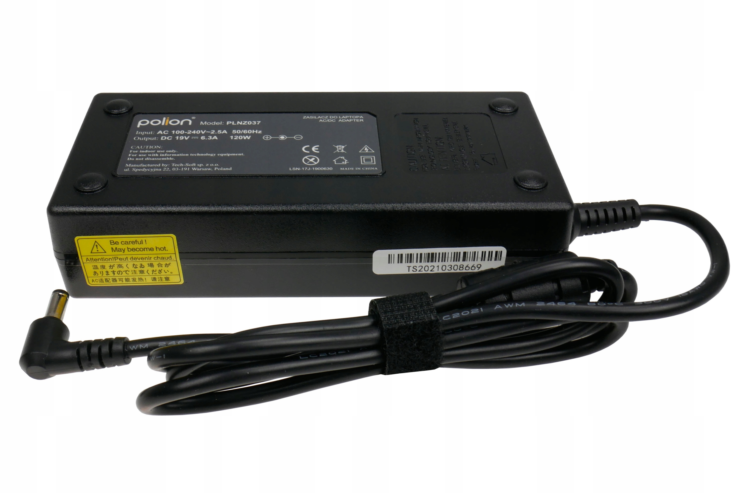 Czarna ładowarka do laptopa z dołączonym kablem, żółtą naklejką ostrzegawczą i tekstem informacyjnym o produkcie.