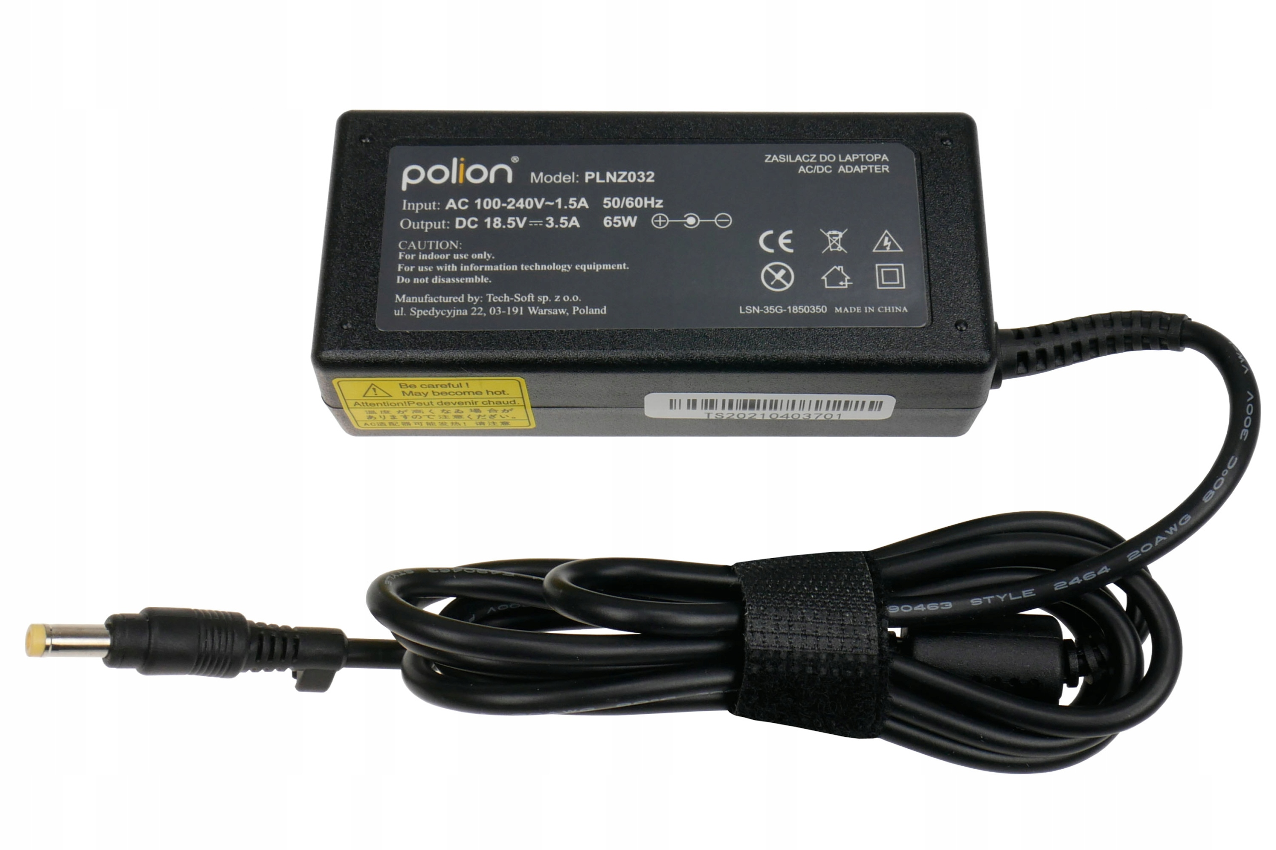 Zasilacz AC/DC do laptopa. Czarny z etykietami tekstowymi. Czarny kabel z wtyczką.