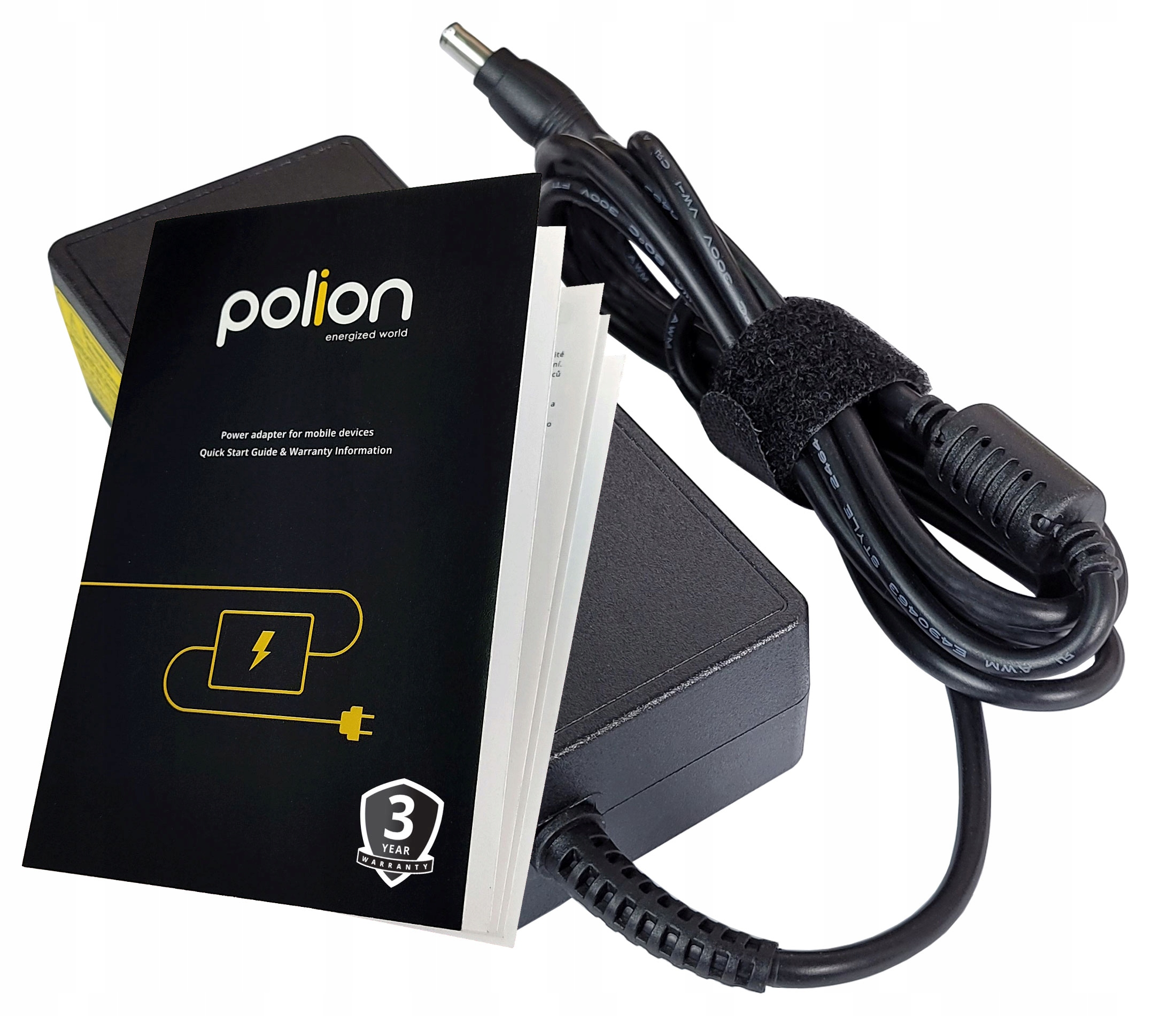 Czarny zasilacz z czarnym kablem i książką z logo Polion.