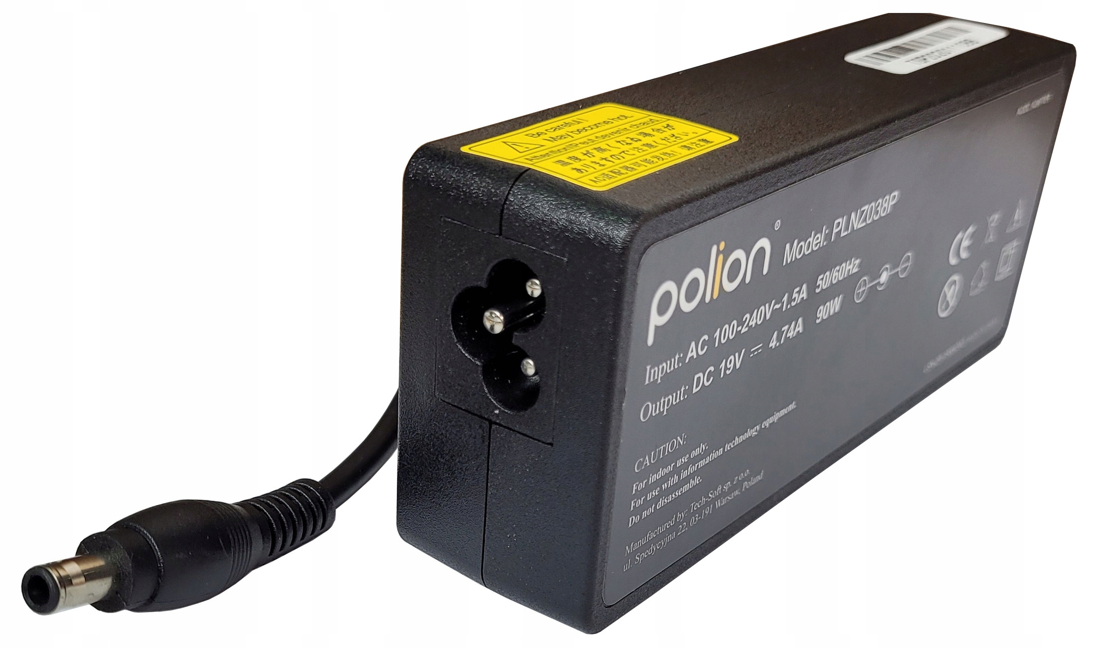 Czarny zasilacz Polion z czarnym kablem i złączem. Żółta etykieta ostrzegawcza na górze. Tekst z boku.