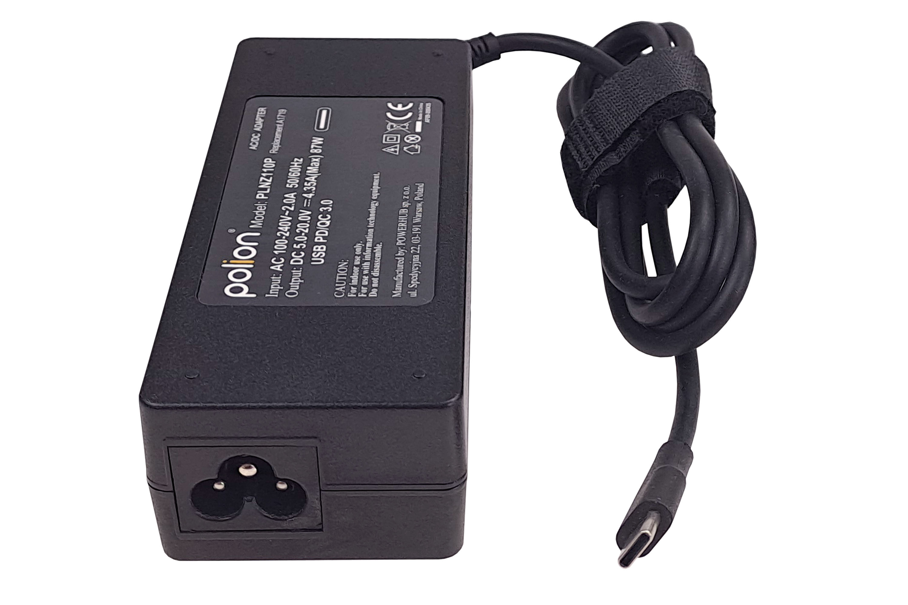 Czarny zasilacz do laptopa z czarnym kablem i złączem. Białe tło.