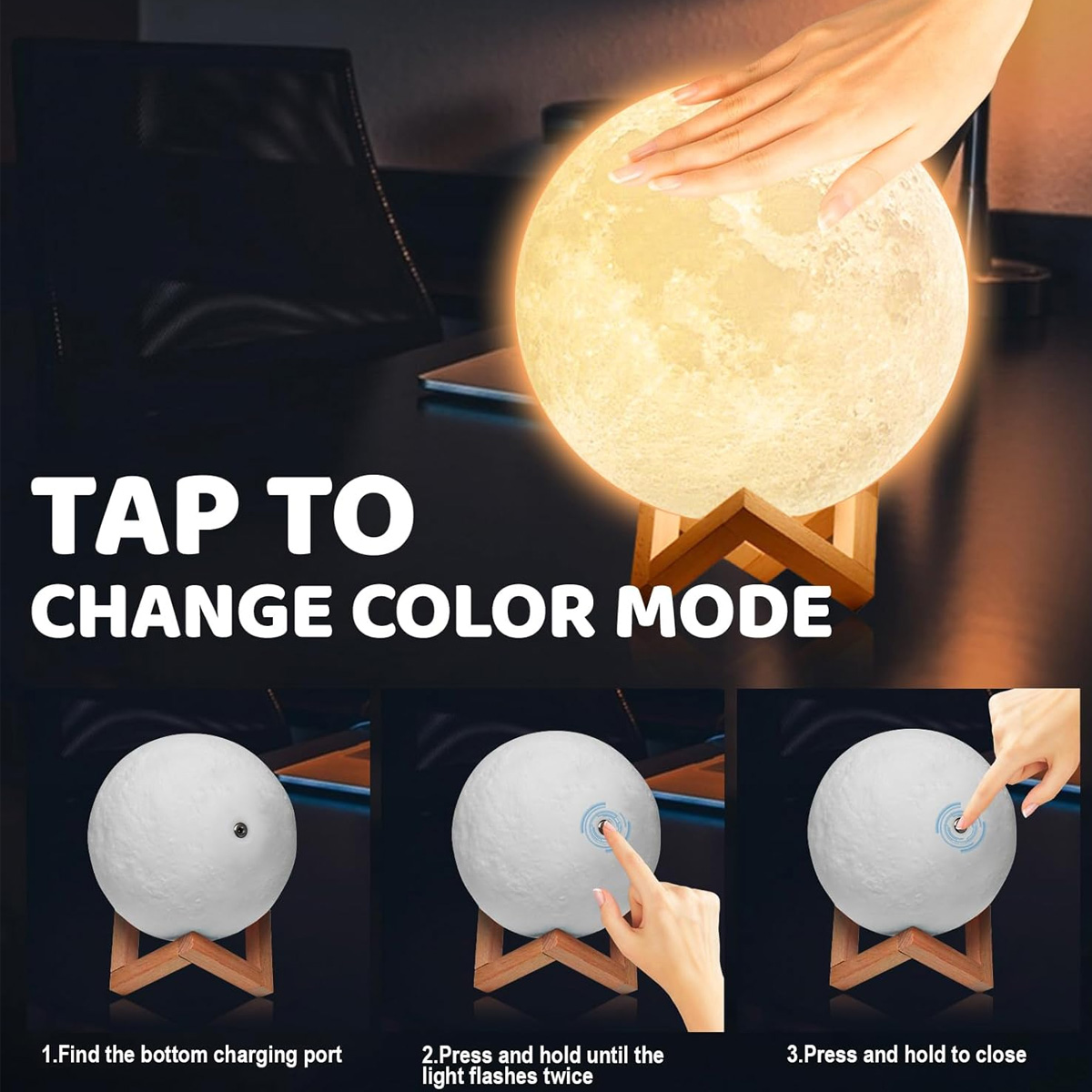 Eine leuchtende Mondlampe, die von einer Hand berührt wird. Anweisungen zum Farbwechselmodus werden unter der Lampe angezeigt.
