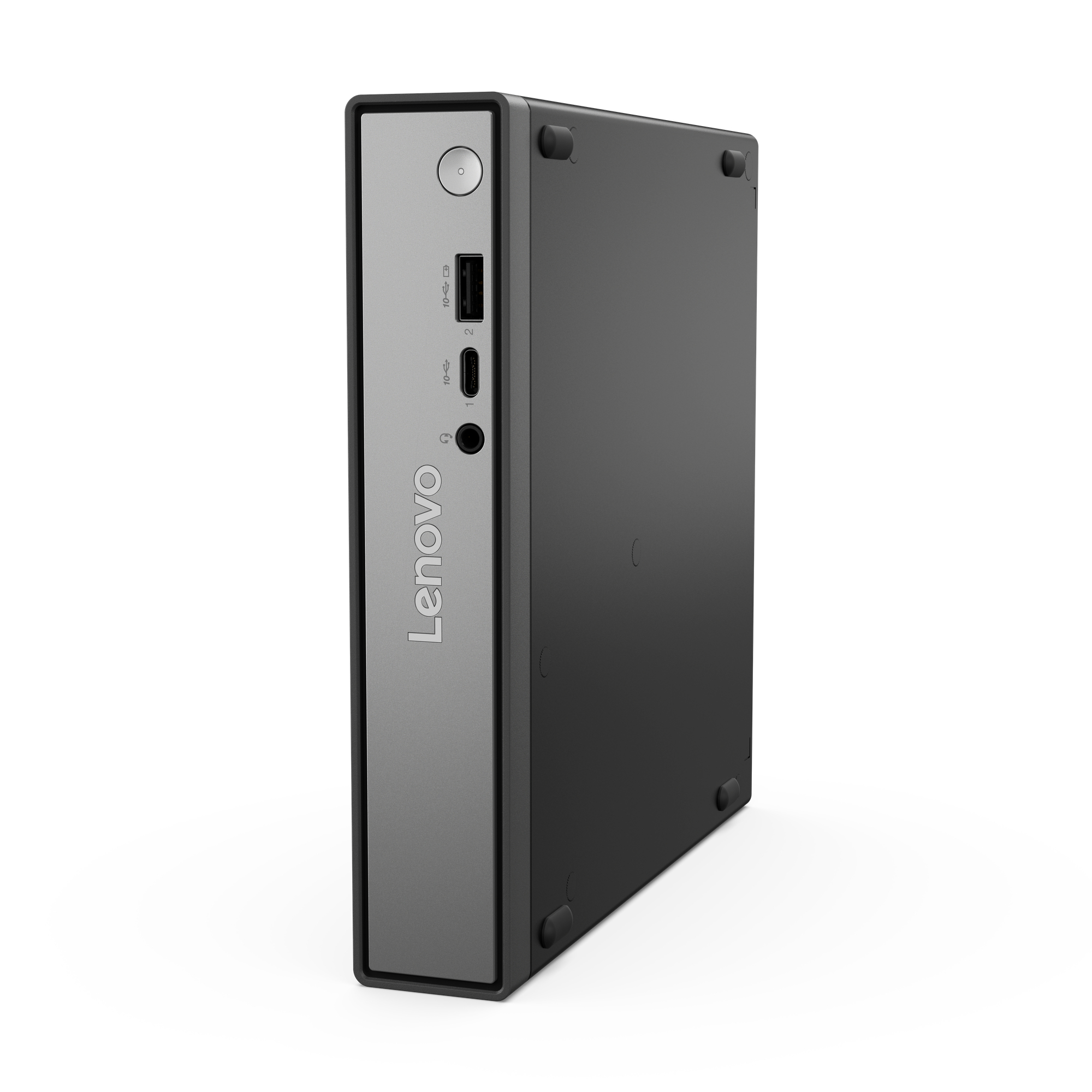 Komputer stacjonarny Lenovo. To małe, czarne pudełko z portami i przyciskiem zasilania z przodu.
