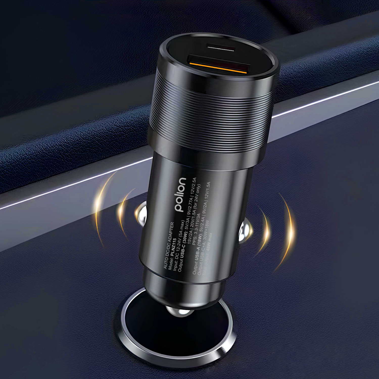 Wyświetlany jest czarny ładowarka samochodowa z portami USB. Znajduje się na ciemnej powierzchni i ma świecące linie.