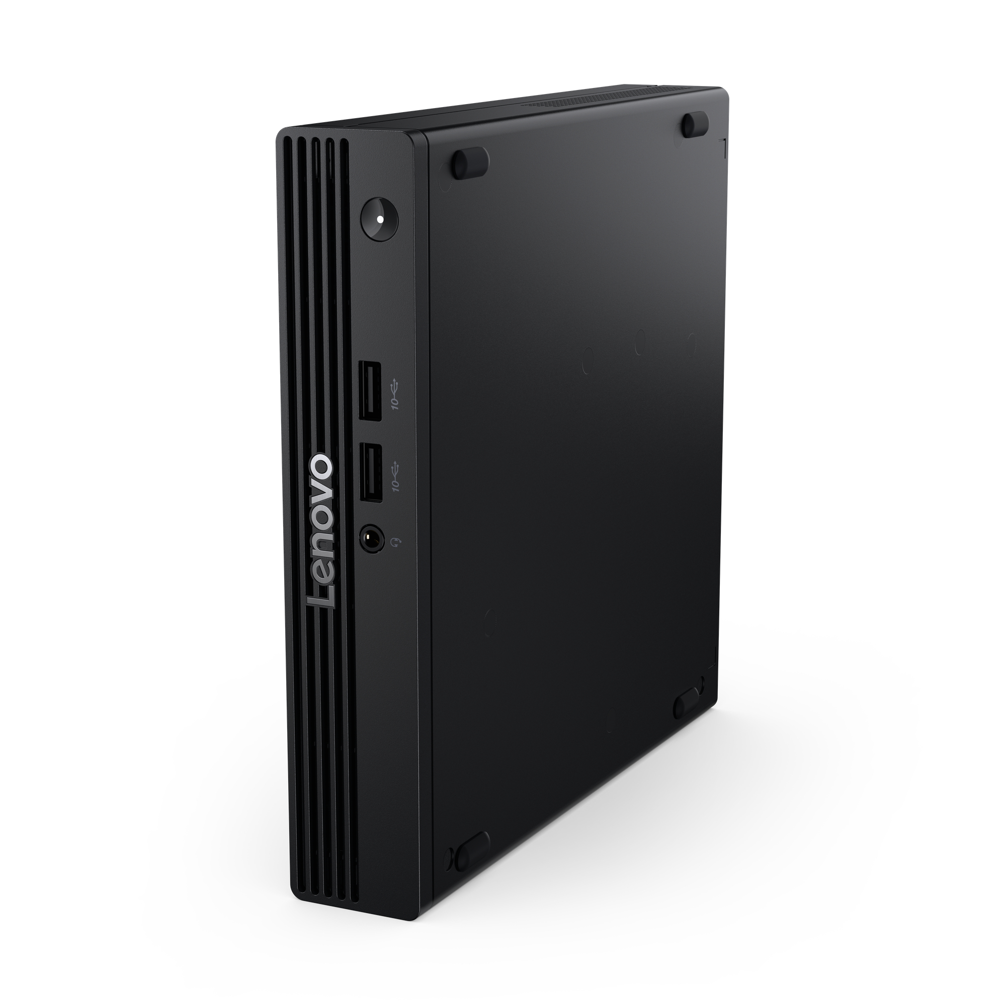 Czarny komputer stacjonarny Lenovo na białej powierzchni. Posiada porty USB i logo Lenovo.