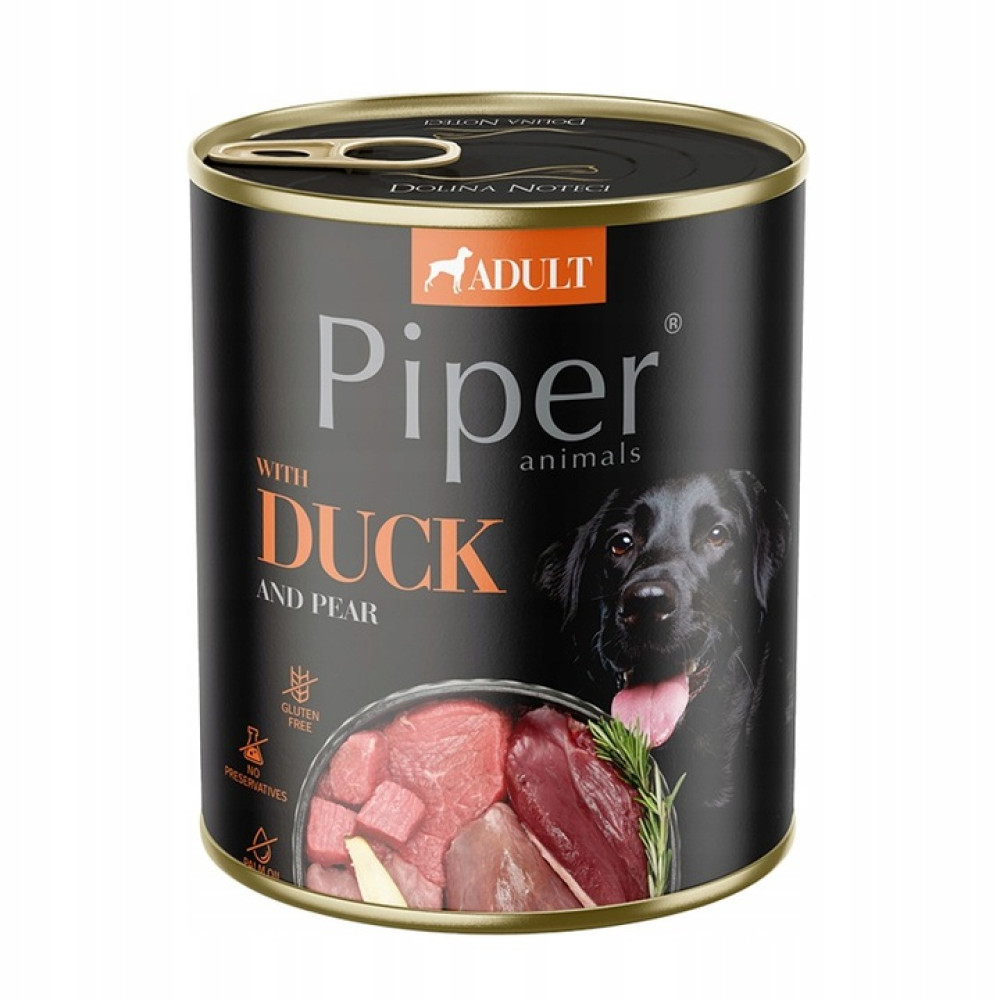 Puszka karmy dla psów z czarną etykietą. Ma tekst 'Piper', 'Kaczka i Gruszka' oraz zdjęcie psa. Puszka pokazuje składniki.