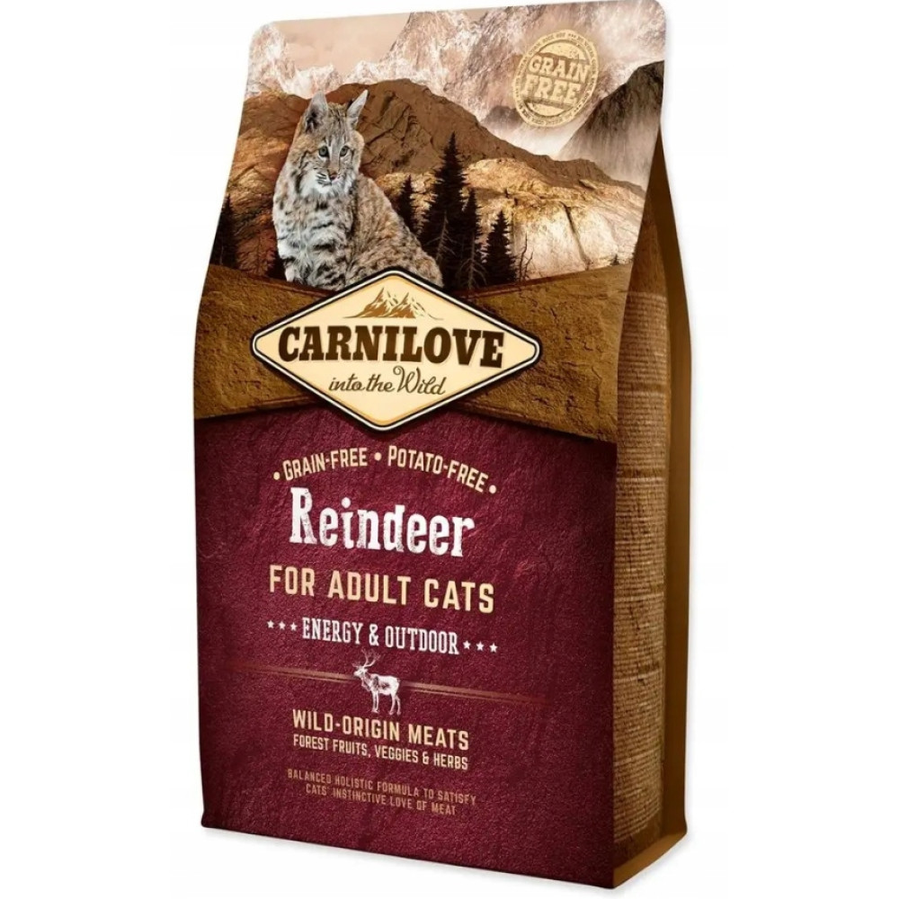 Torba karmy dla kotów ze zdjęciem rysia, tło górskie. Tekst zawiera 'Reindeer', 'Grain Free' i 'For Adult Cats'.