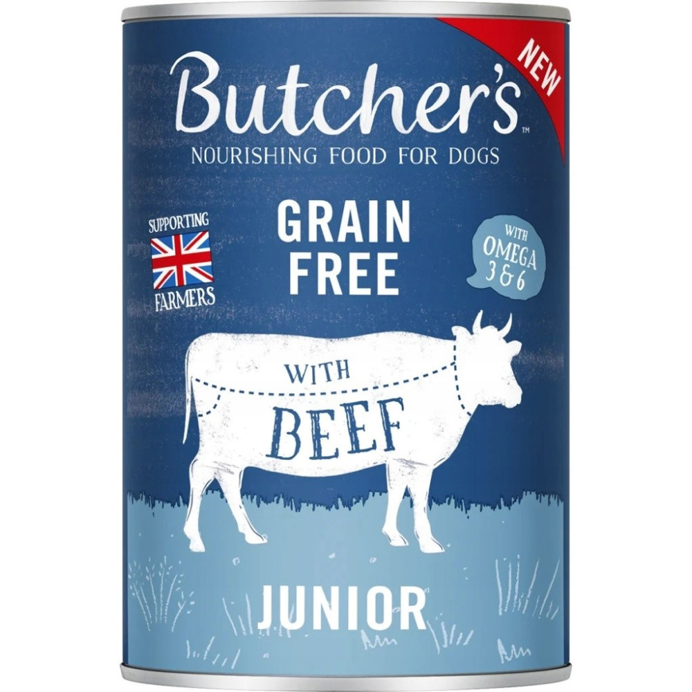 Puszka karmy dla psów z etykietą 'Butcher's'. Widnieje napis 'Grain Free', 'With Beef' i 'Junior'. Zawiera ilustrację krowy i flagę Wielkiej Brytanii.