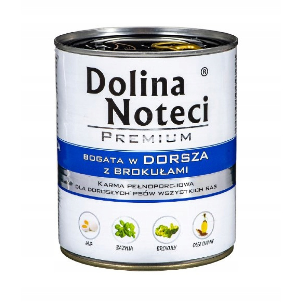 Puszka karmy dla psów z napisem 'Dolina Noteci'. Zawiera słowa 'Premium' i 'Bogata w dorsza z brokułami'. Widoczne są ikony składników.