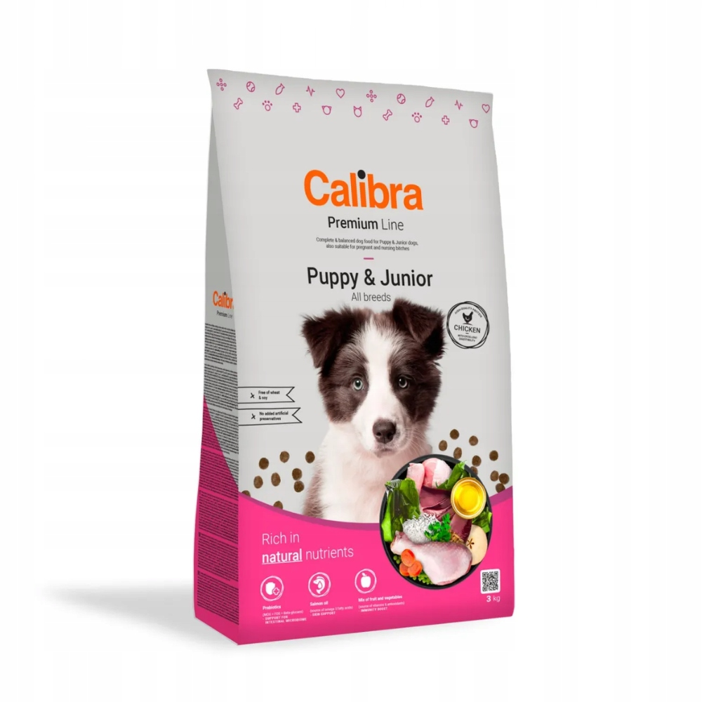 Bolsa de comida para perros con imagen de cachorro. La marca es Calibra, Puppy & Junior, con ilustraciones de ingredientes. Embalaje rosa y blanco.