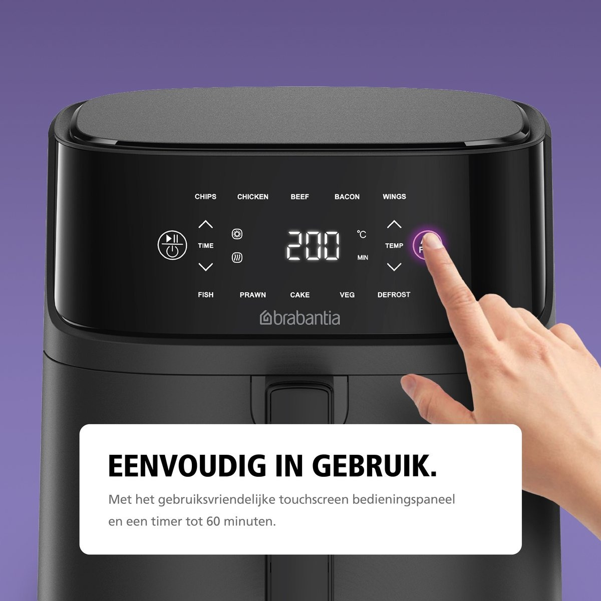 A hand is pressing the temperature button on a black air fryer. The display shows 200 degrees.