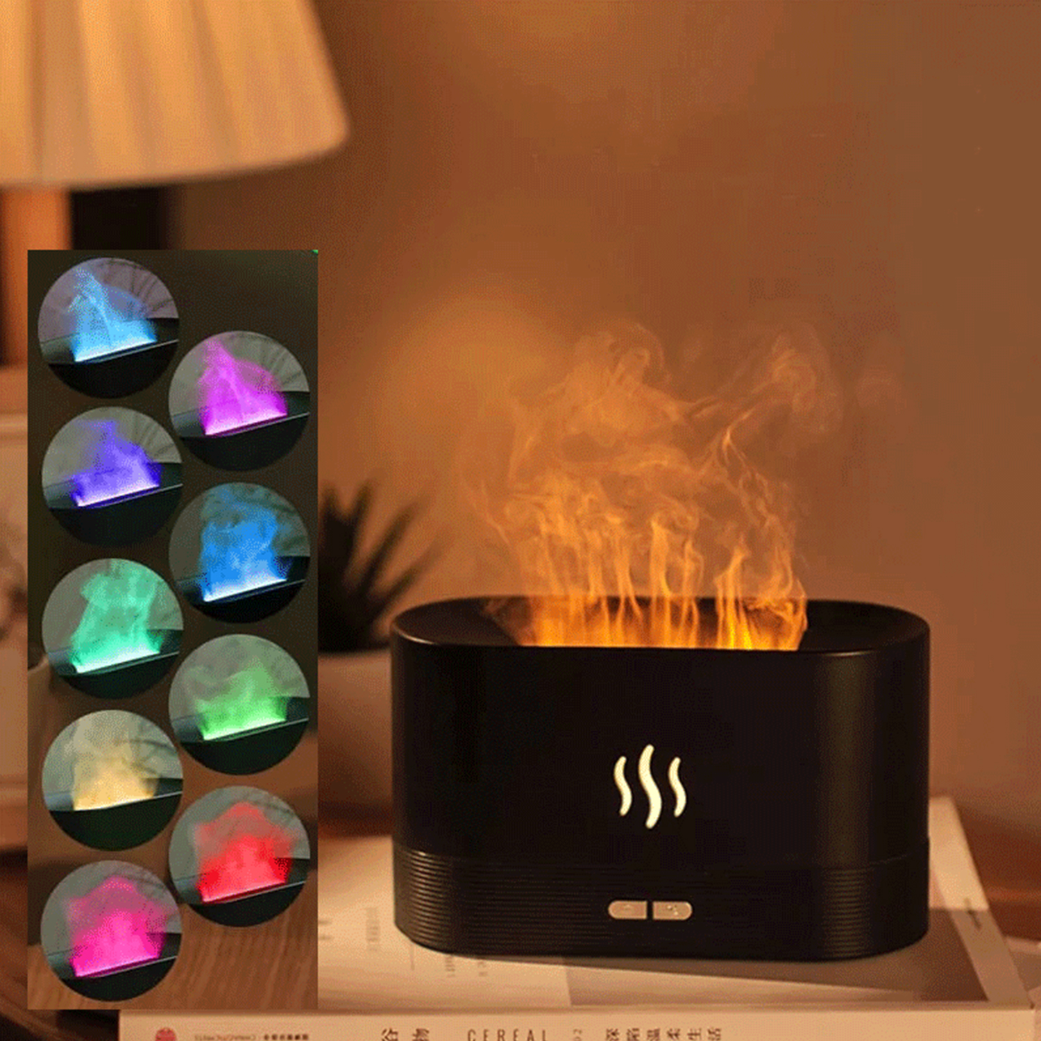 Un umidificatore a fiamma nero con effetto fiamma. Un piccolo display mostra diversi colori della fiamma. È su un libro.