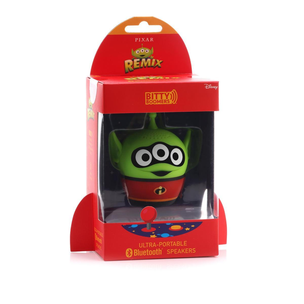 Kırmızı bir kutuda yeşil bir uzaylı hoparlör. Kutuda 'Remix' ve 'Bitty Boomers' yazıyor. Bir Disney ürünü ve 'Ultra-portable Bluetooth Speakers' yazıyor.