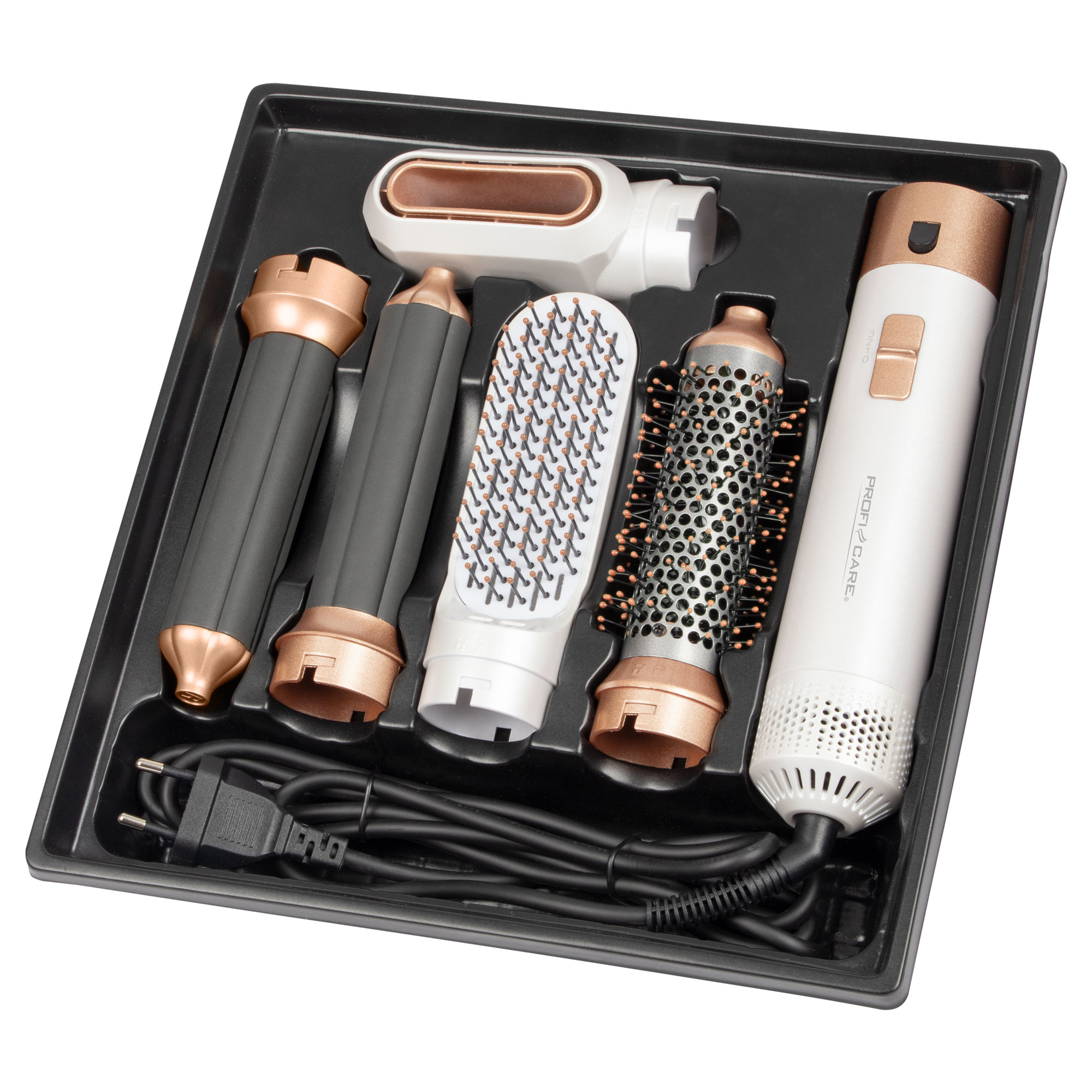 Zestaw do stylizacji włosów w czarnej tacy. Zawiera białą i złotą suszarkę i akcesoria.
