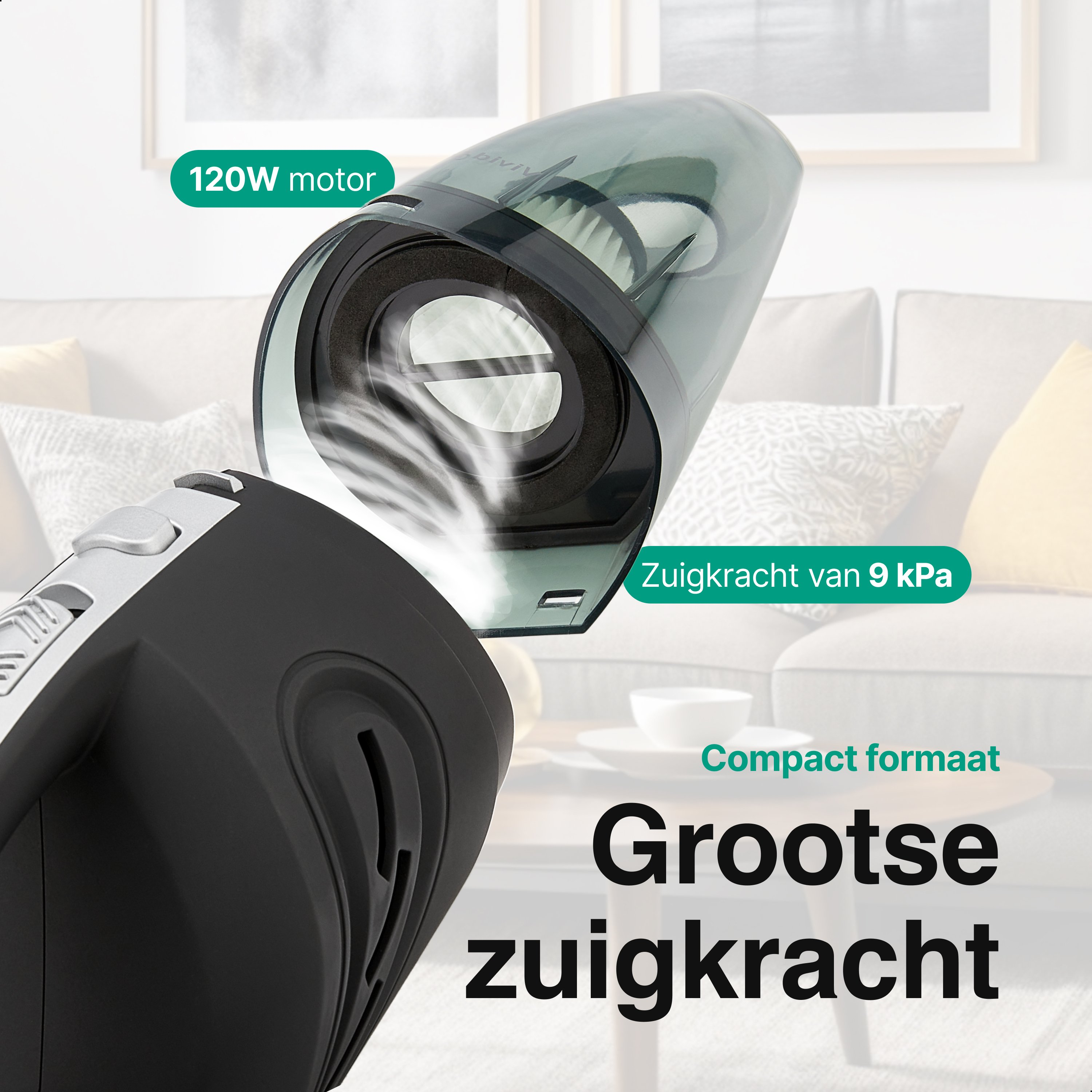 Un aspirateur à main. Il a un corps noir et un conteneur à poussière transparent, avec des étiquettes.