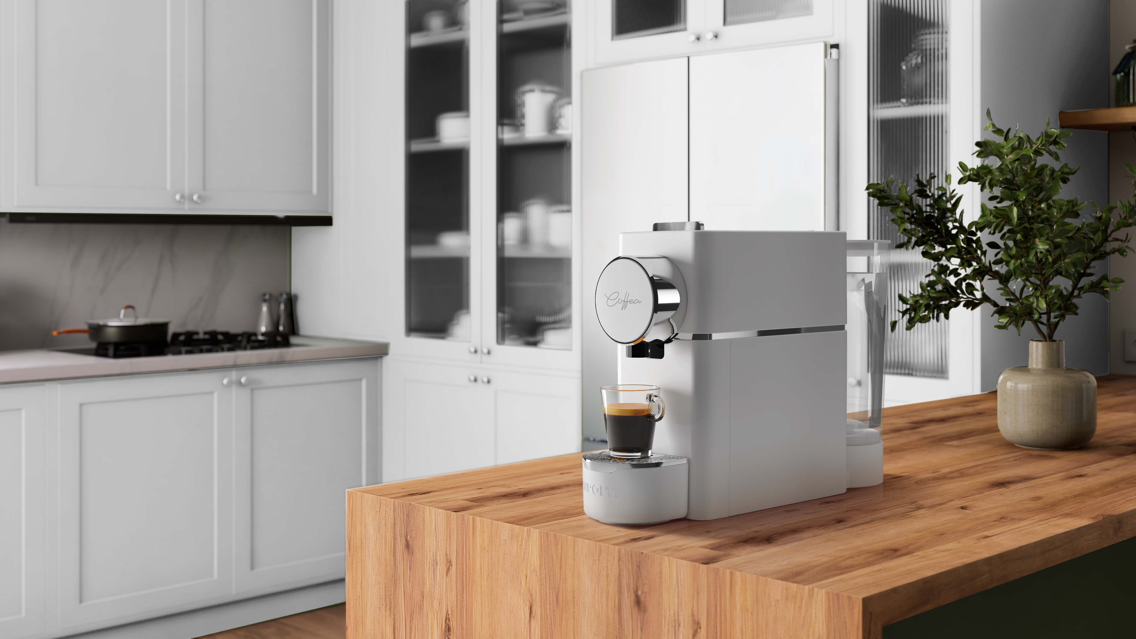 Una cocina moderna con cafetera. Se llena una taza con café. Una maceta está sobre la encimera de madera.