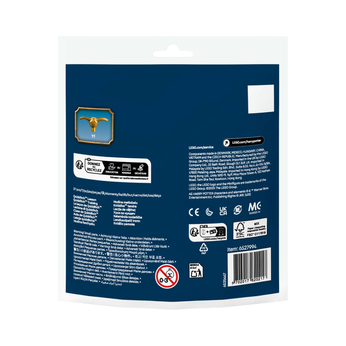 Pudełko LEGO Harry Potter. Ma złoty znicz i tekst w wielu językach.